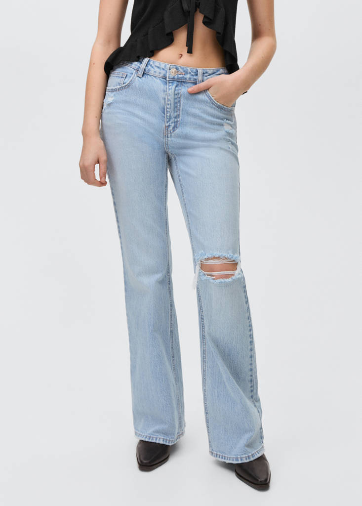 Flared jeans with decorative rips — Light Blue