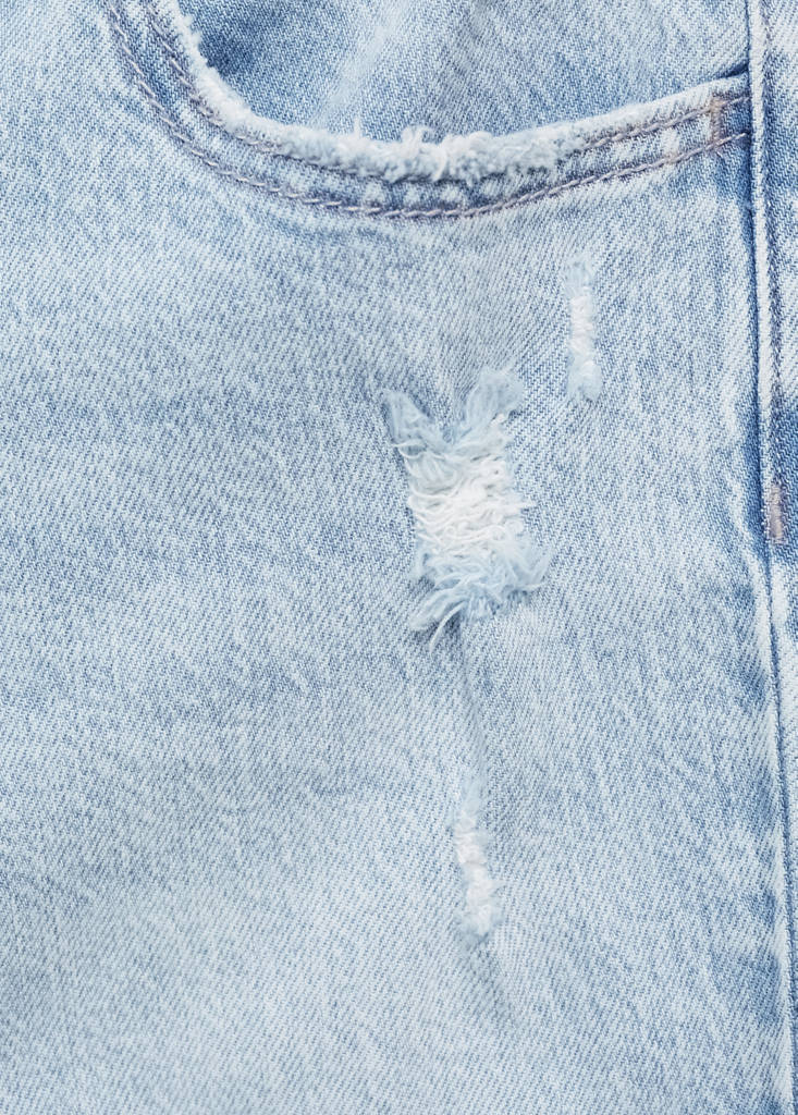 Flared jeans with decorative rips — Light Blue