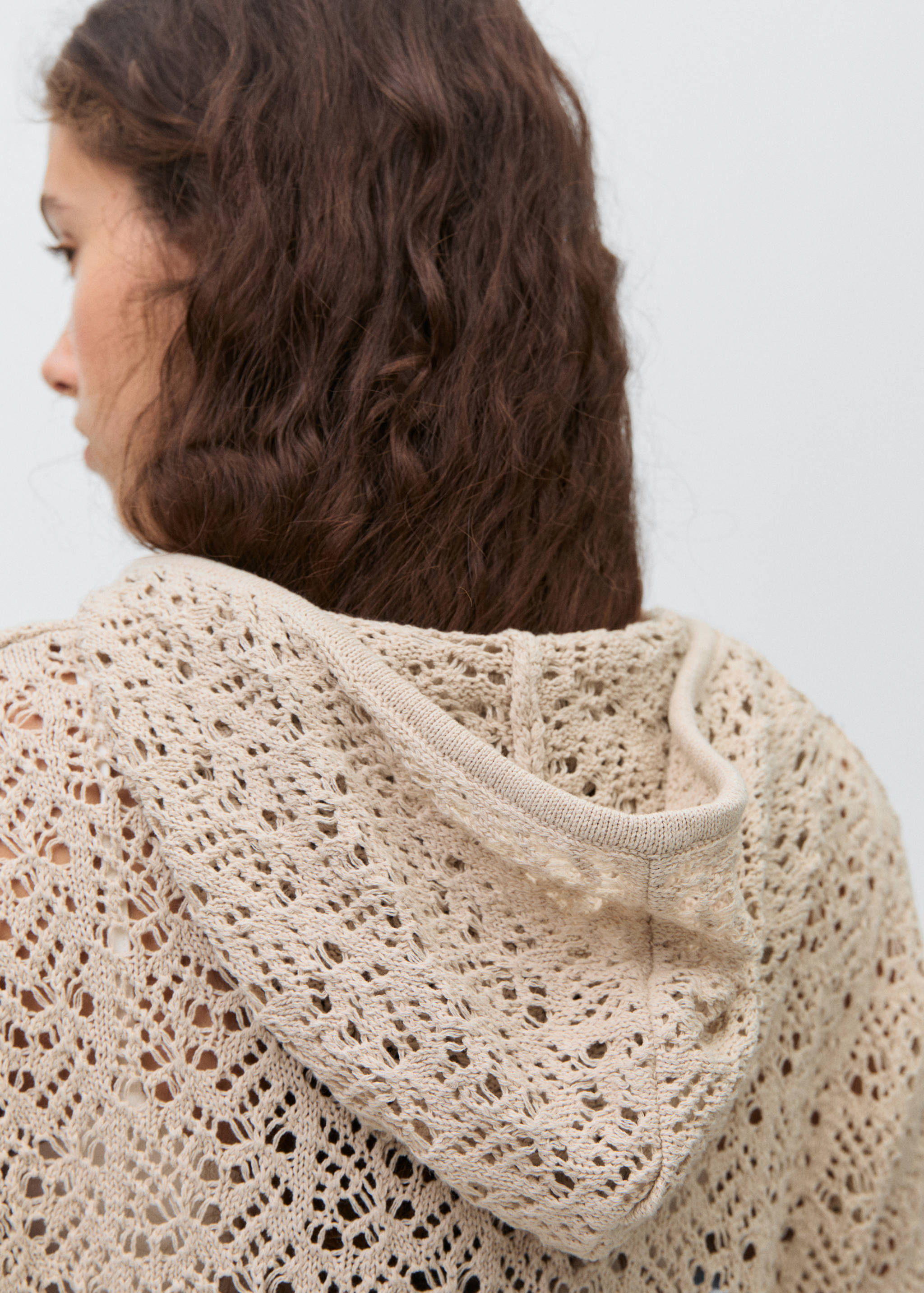 Knitted sweater with hood and lace pattern - Details of the article 2