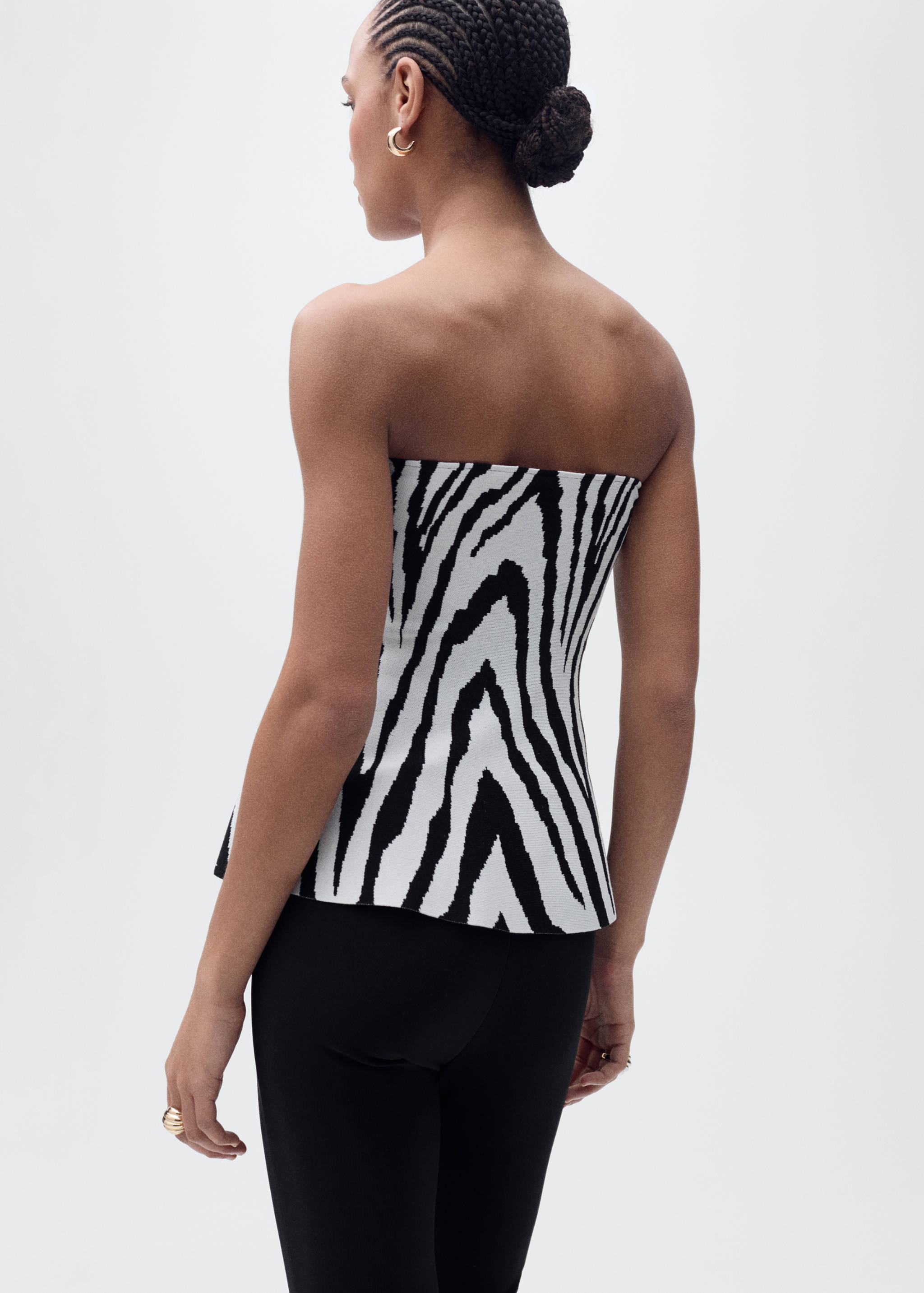 Strapless peplum top - Reverse of the article