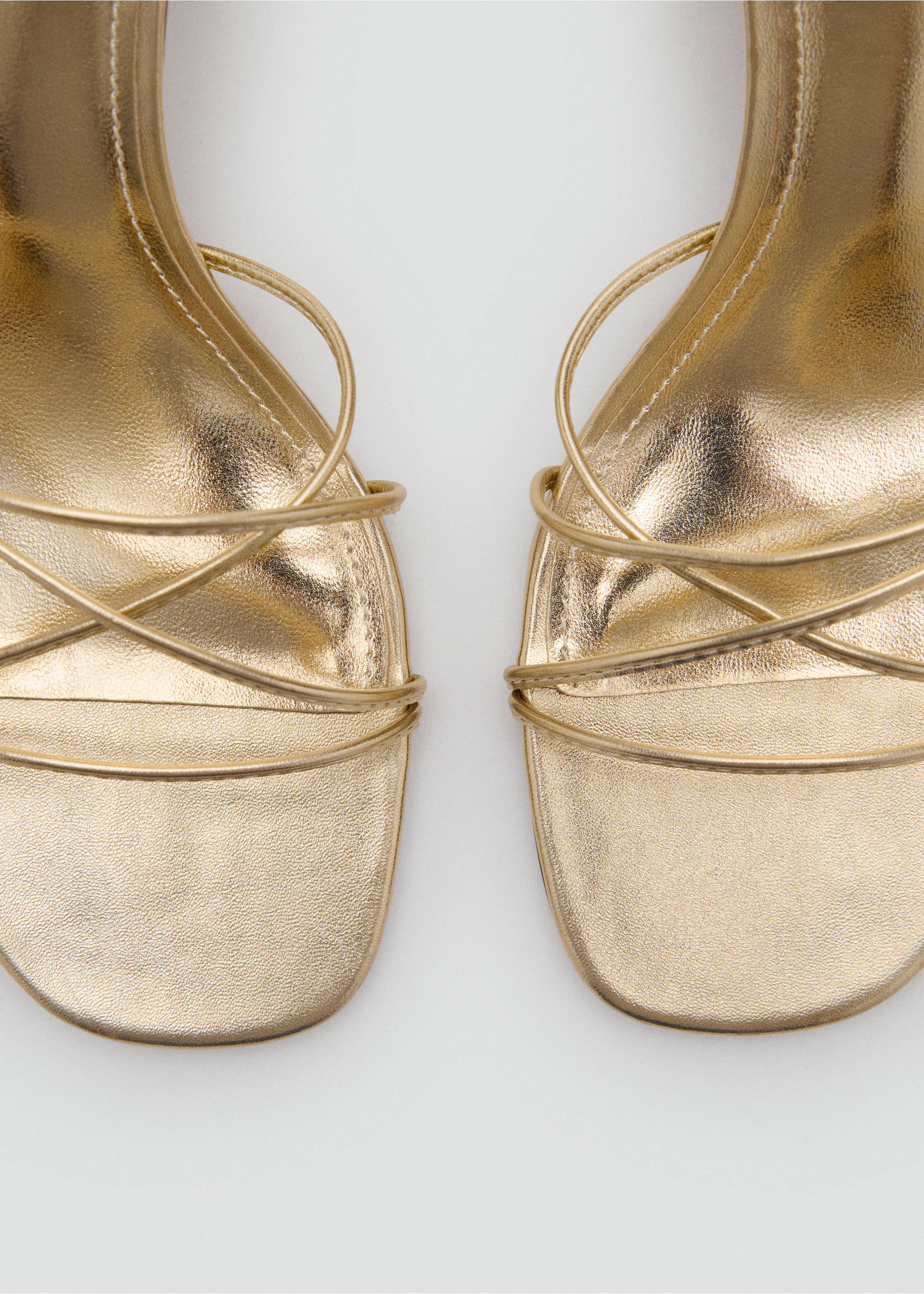 Crossed strap heeled sandal - Details of the article 1, Gold. Ref: 87075934-00.