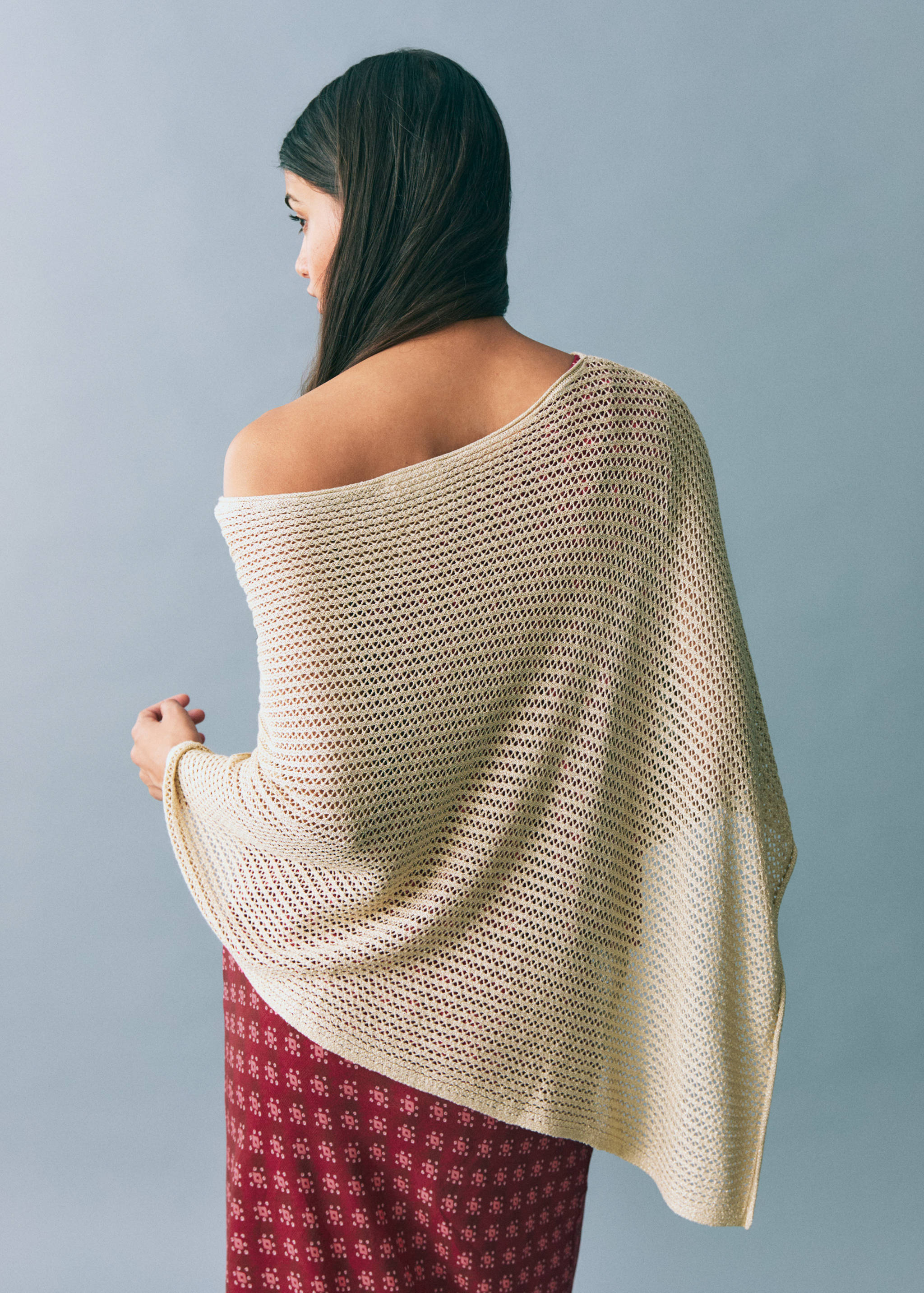 Knit cape - Reverse of the article
