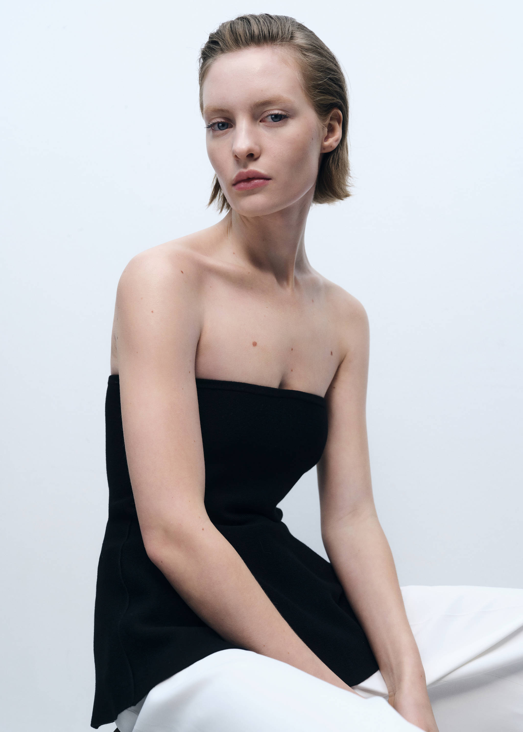 Finstickad peplumtopp - Bild av mittparti