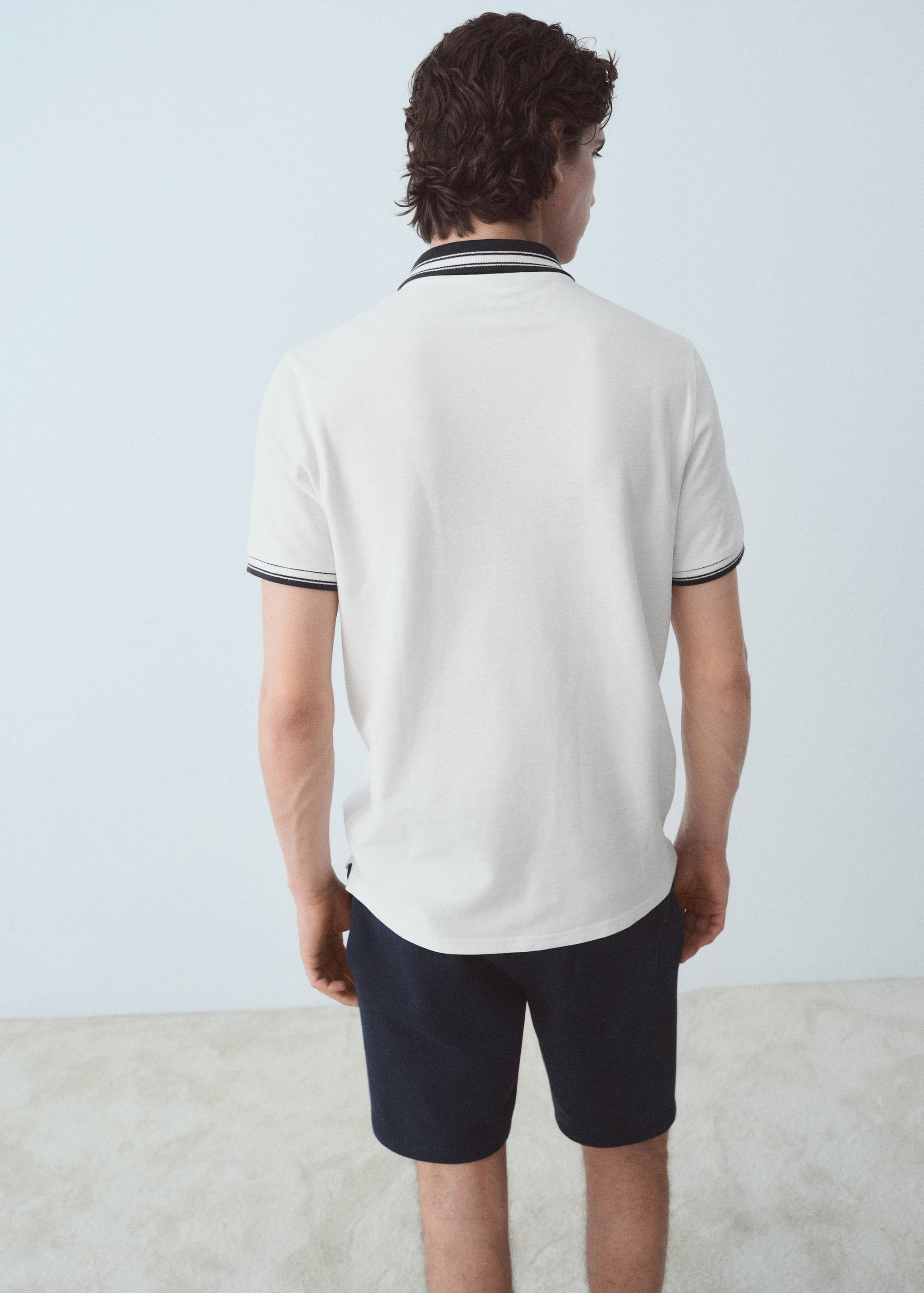 Contrasting neck cotton polo shirt - Reverse of the article