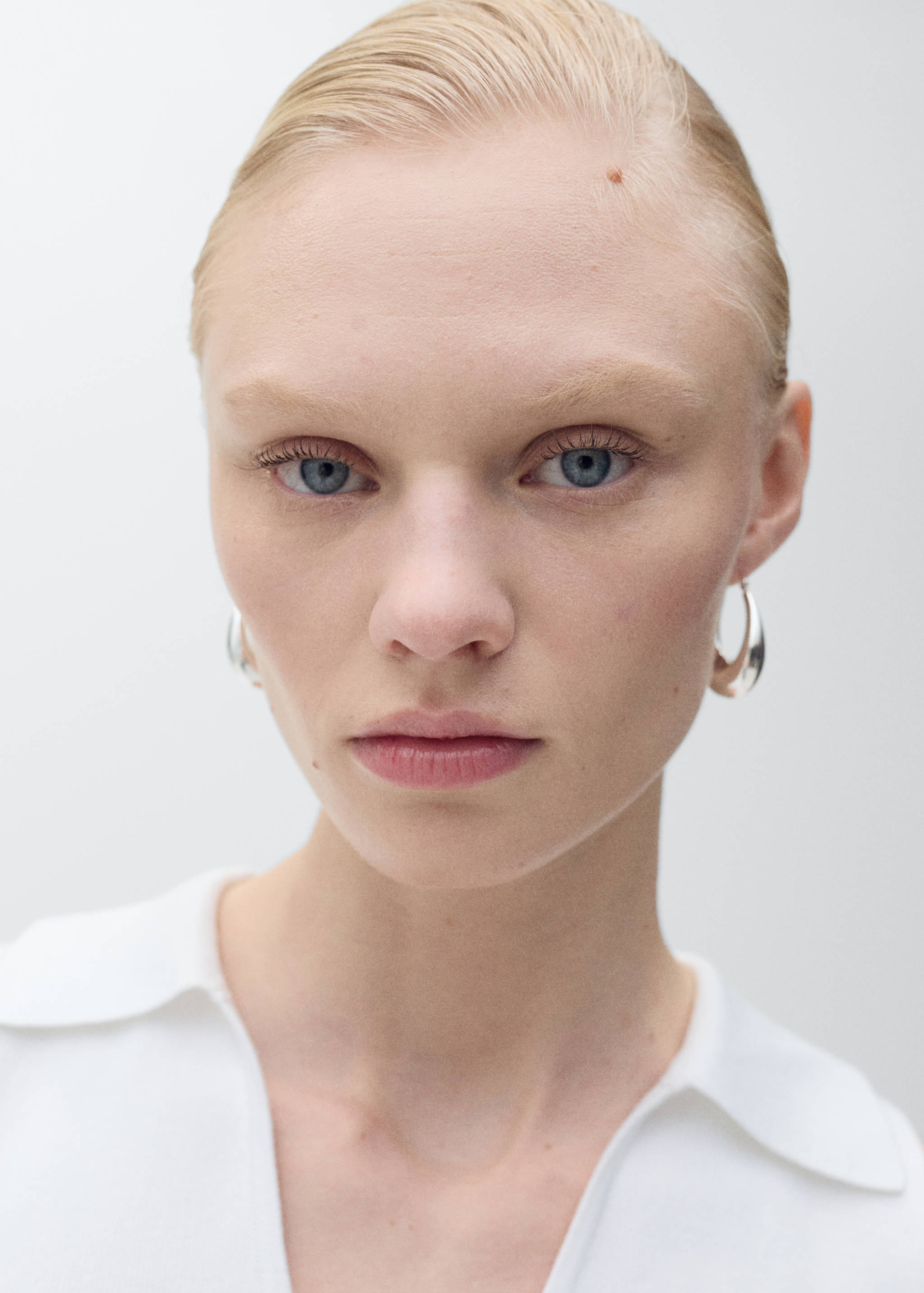 Top de malha com gola de polo - Pormenor do artigo 1