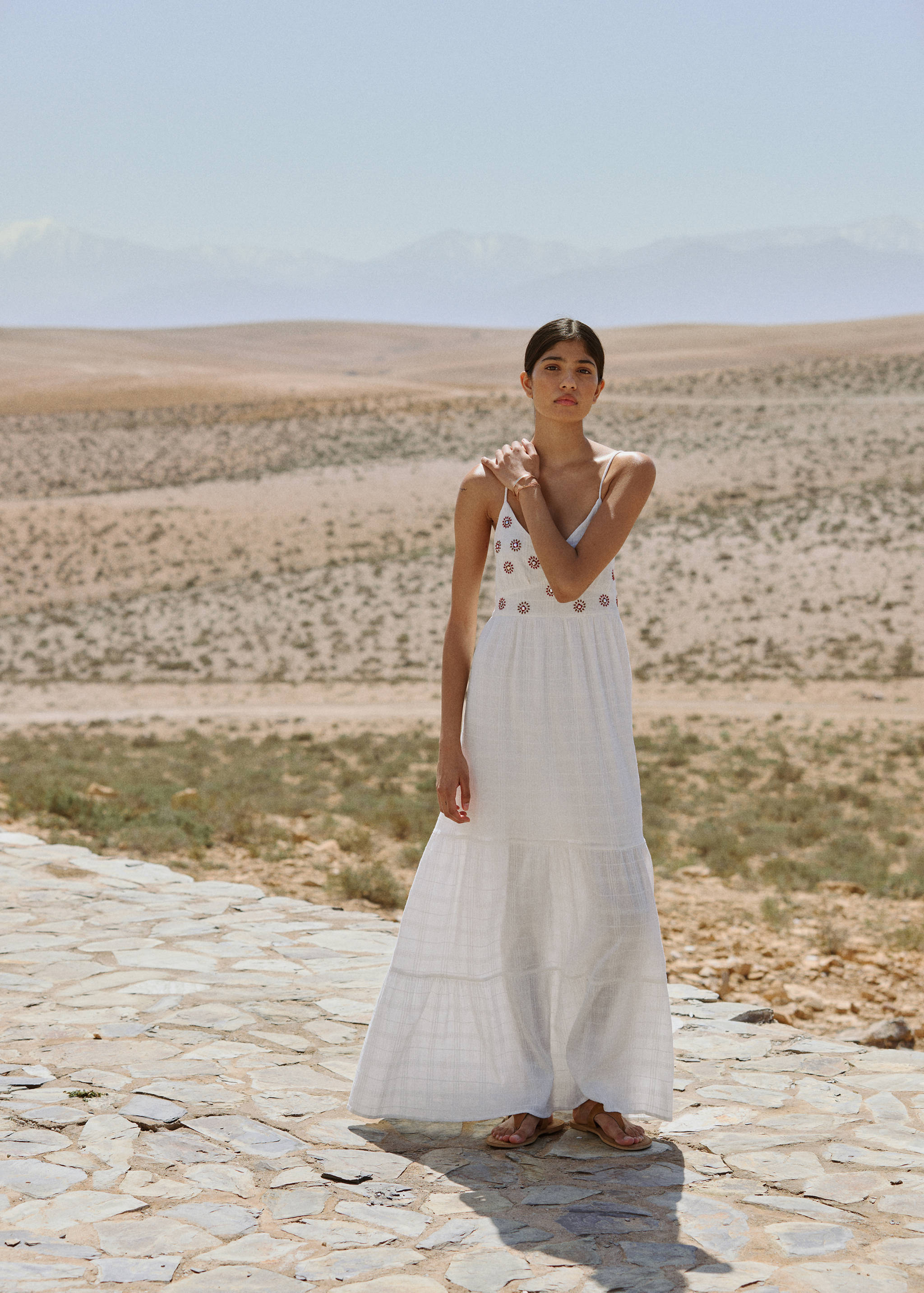 Embroidered dress with suns - Details of the article 5