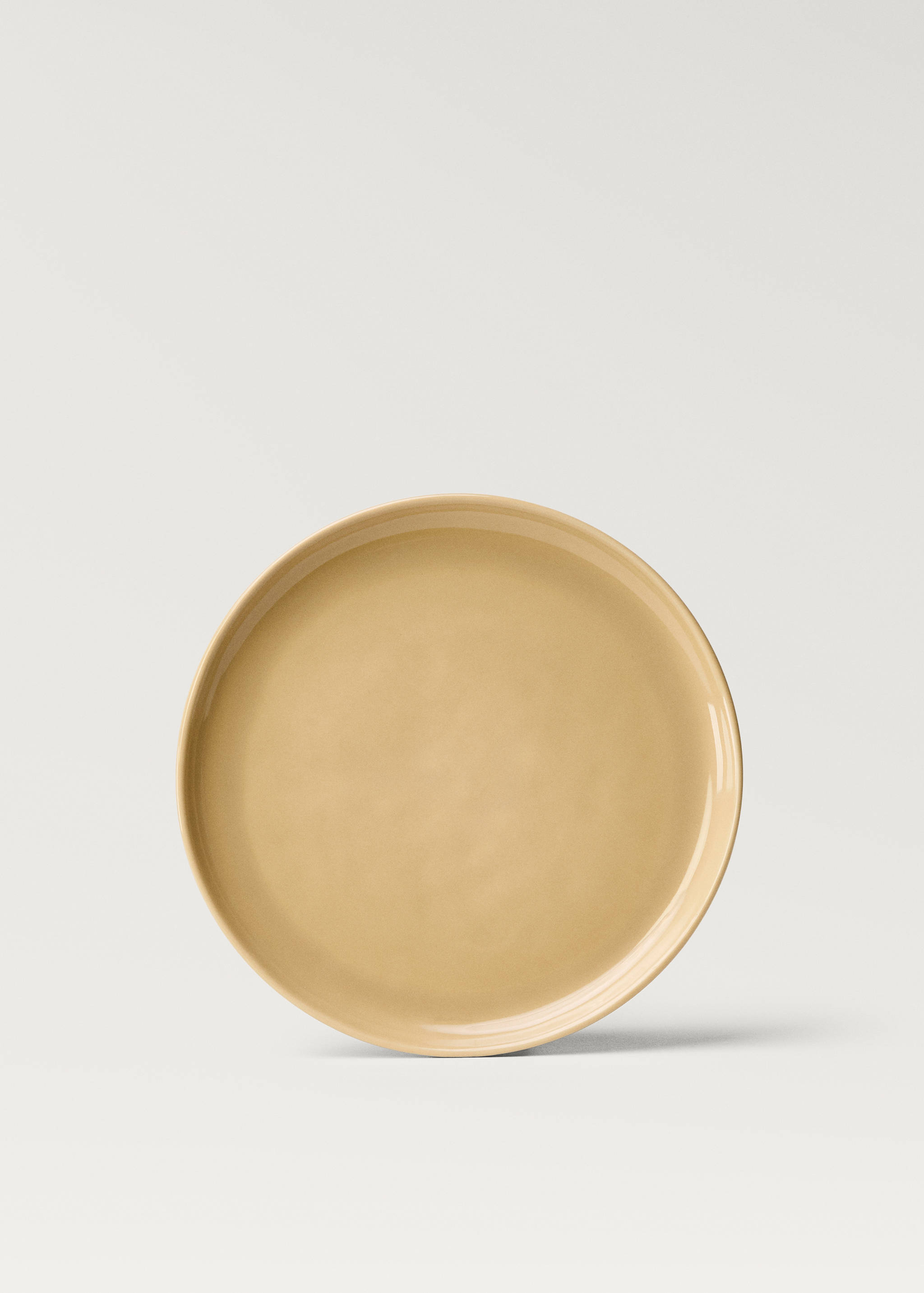 Flat tallrik i stengods med enkel design - Artikel utan modell