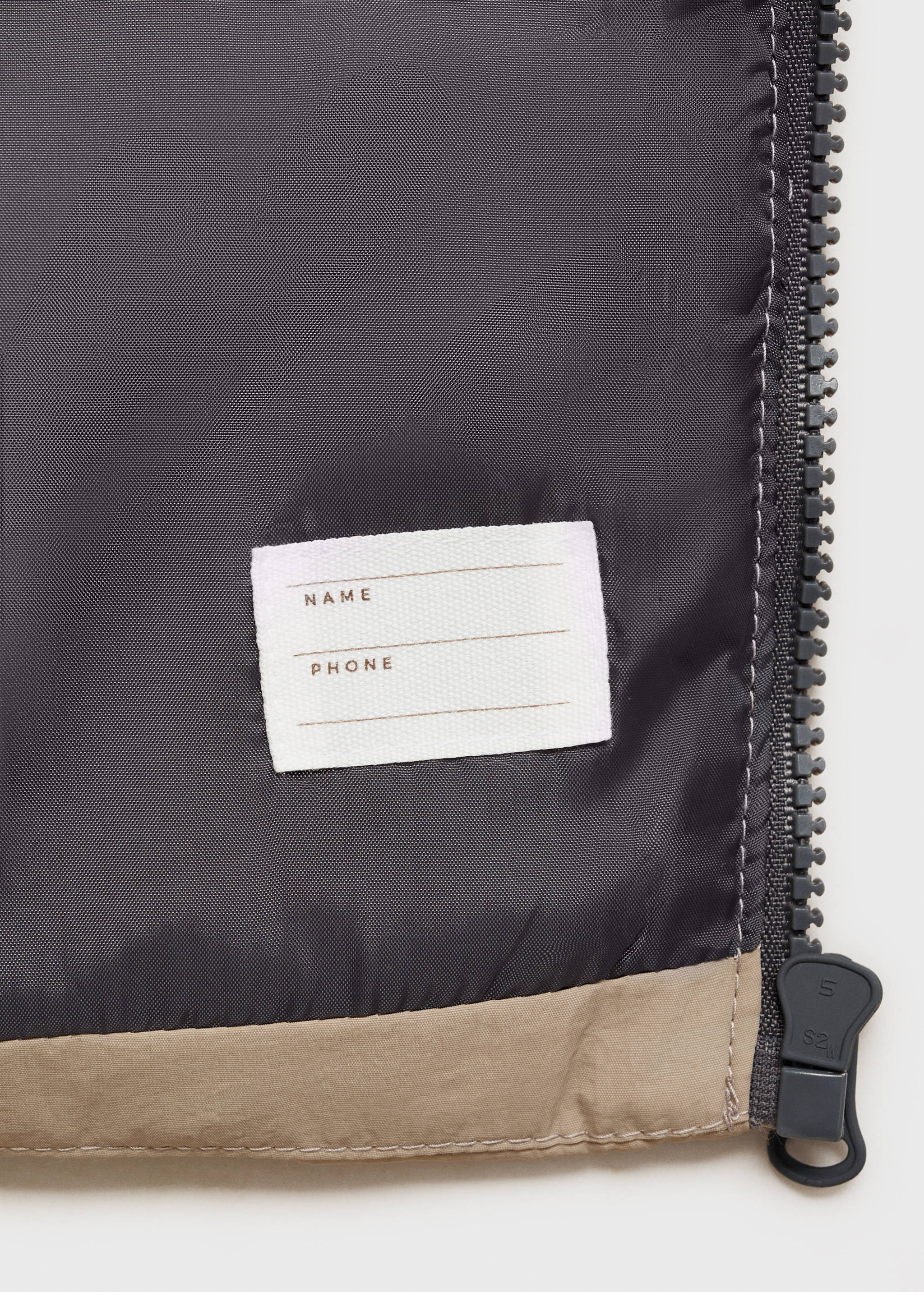 Armilla embuatada - Detall de l'article 0