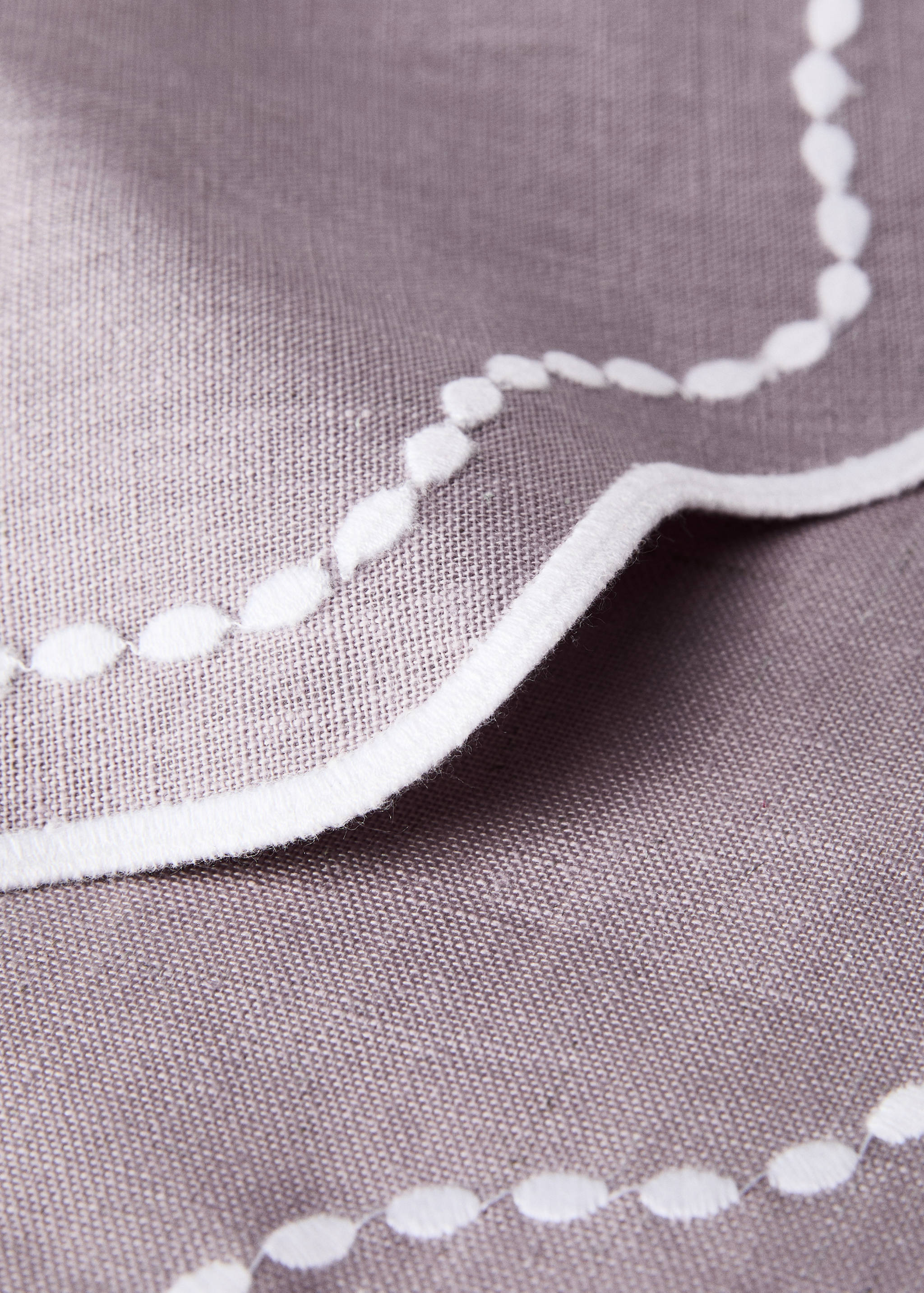 Gecoate placemat van geweven linnen met golvende afwerking - Detail van het artikel 1