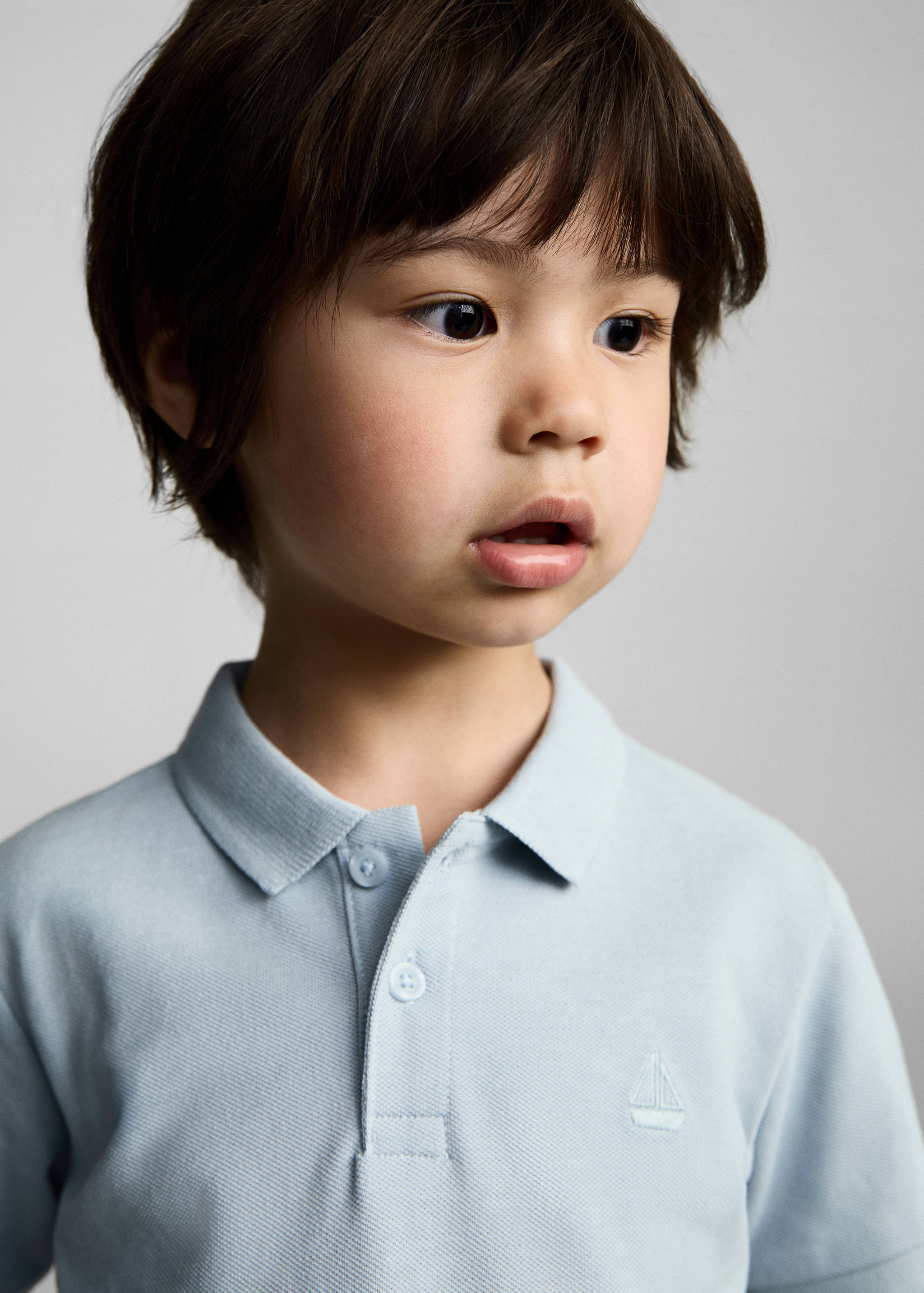 Short-sleeve knitted polo shirt - Details of the article 1