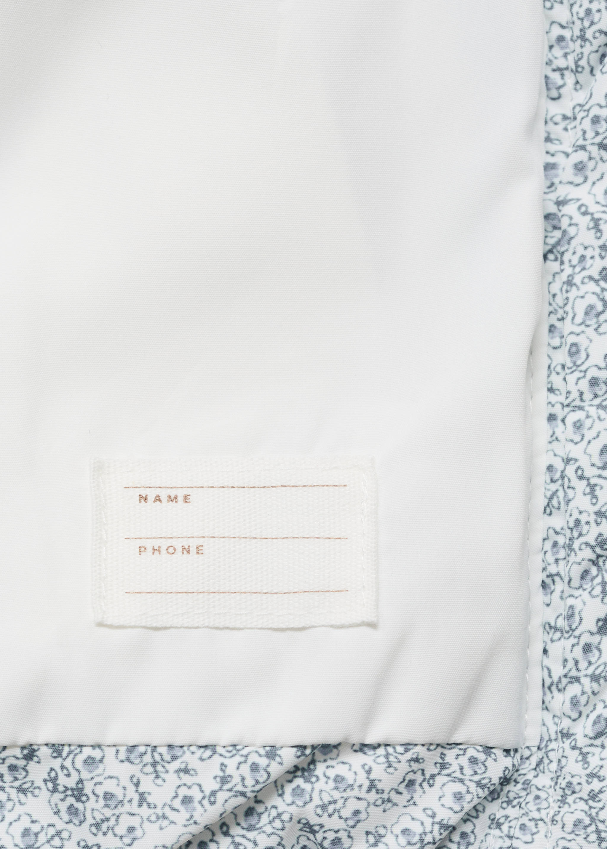 Printed quilted gilet - Details of the article 0