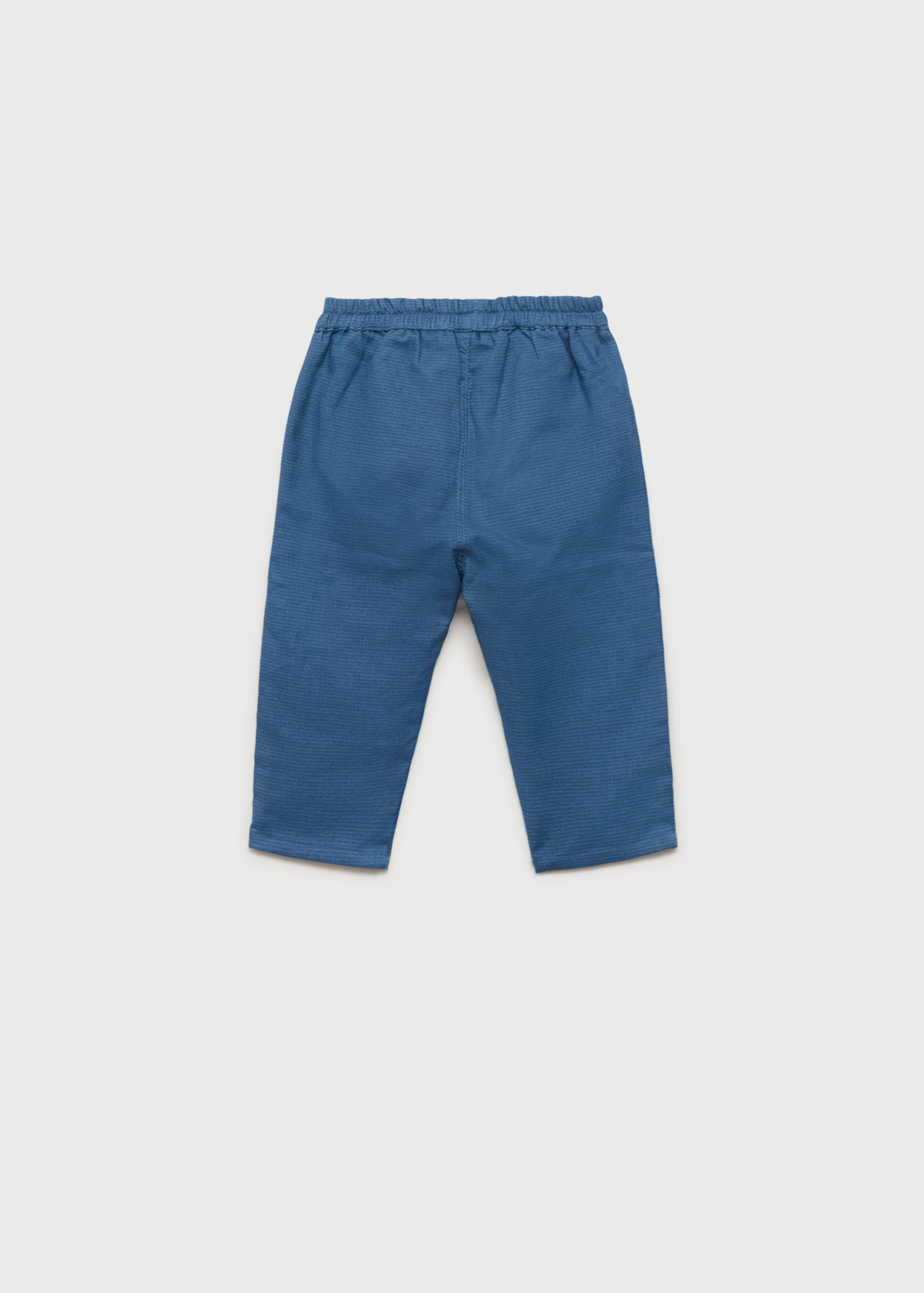 Textured cotton trousers - Reverse of the article