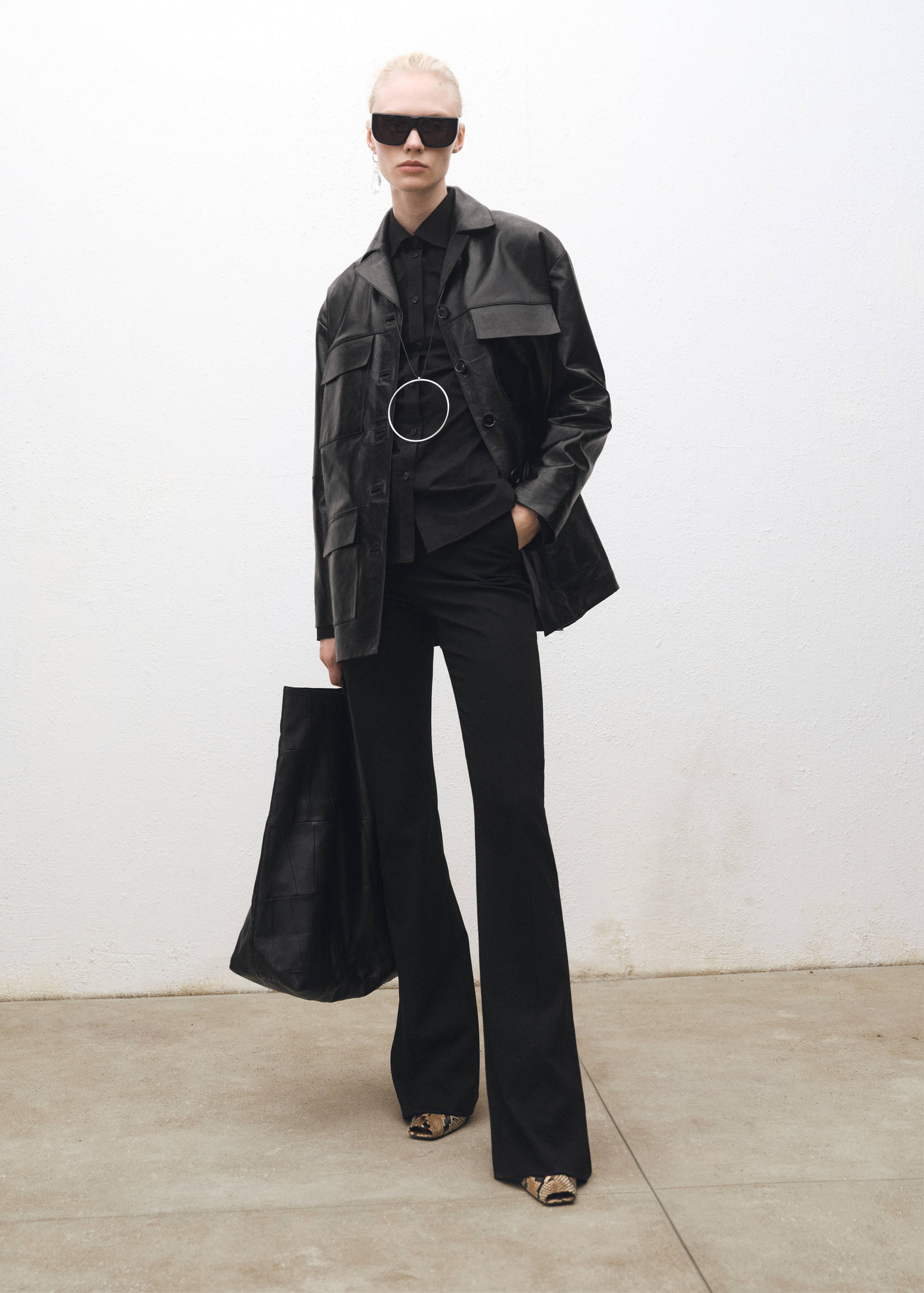 Flared suit pants with openings - General plane