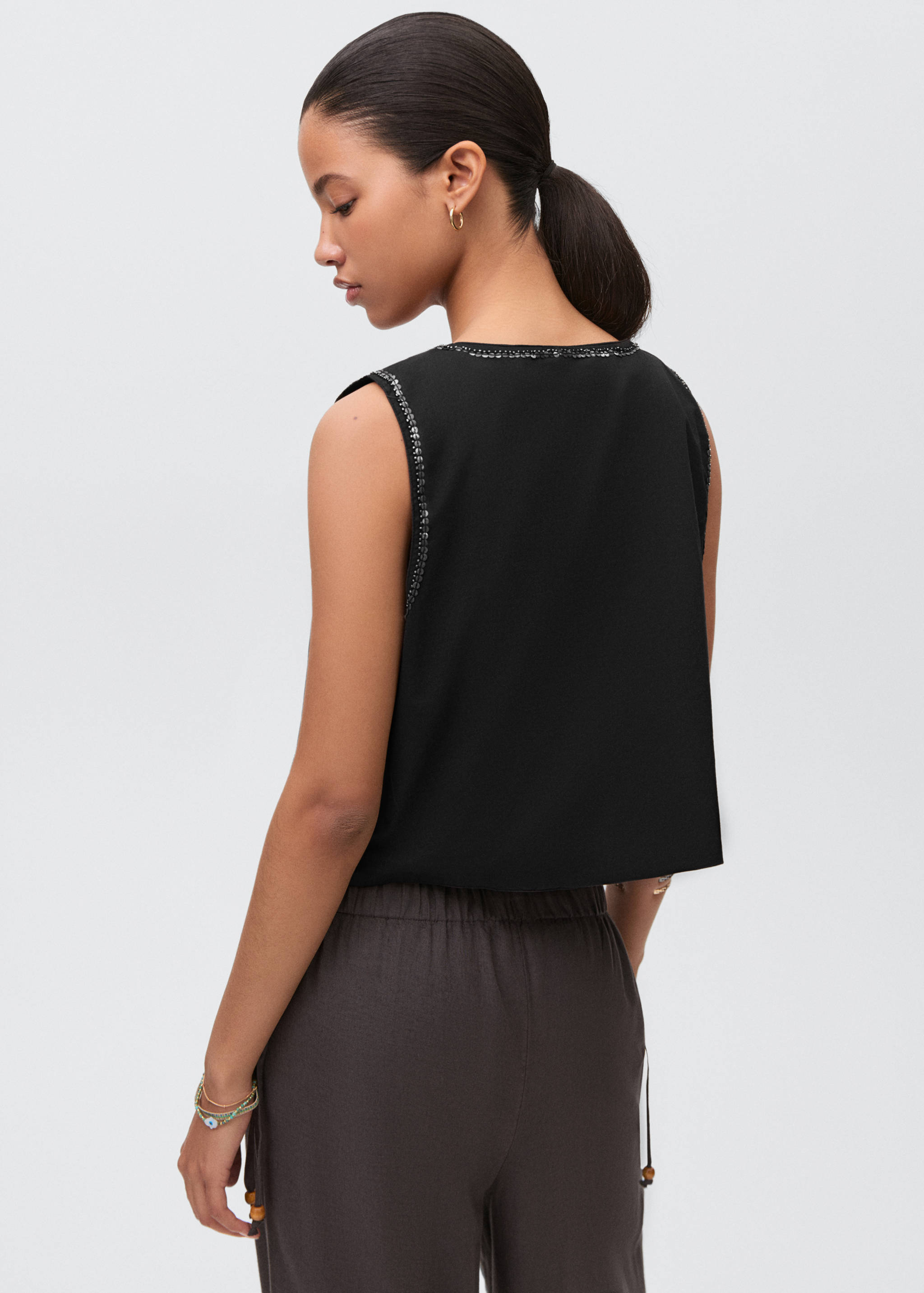 Colete bordado com contas - Verso do artigo