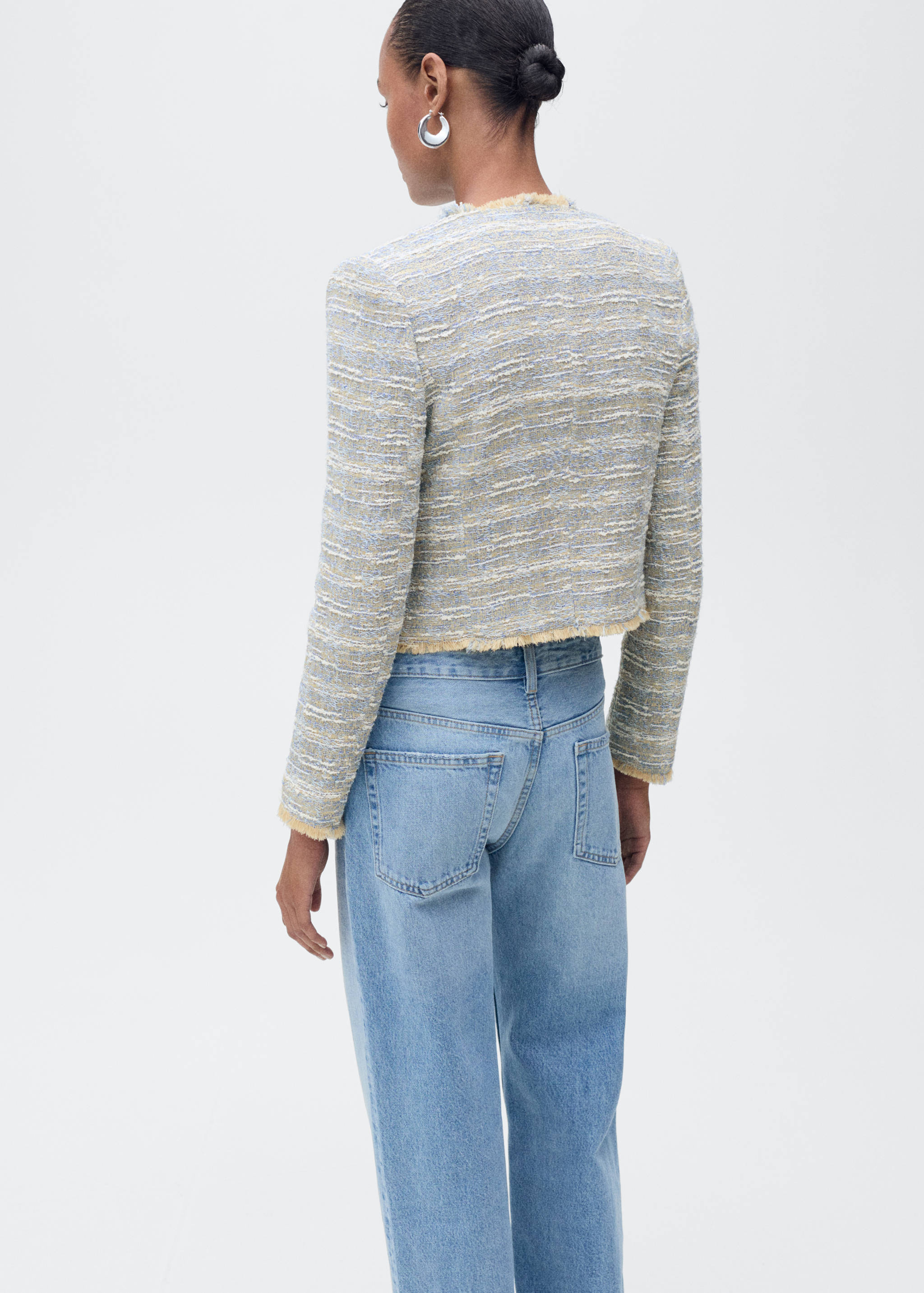 Tweed jacket with frayed ends - Reverse of the article