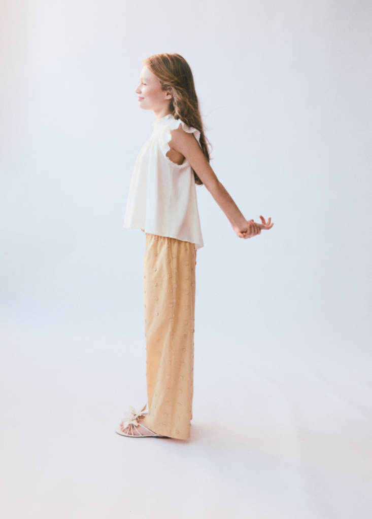 Long trousers with embroidered details — Mustard