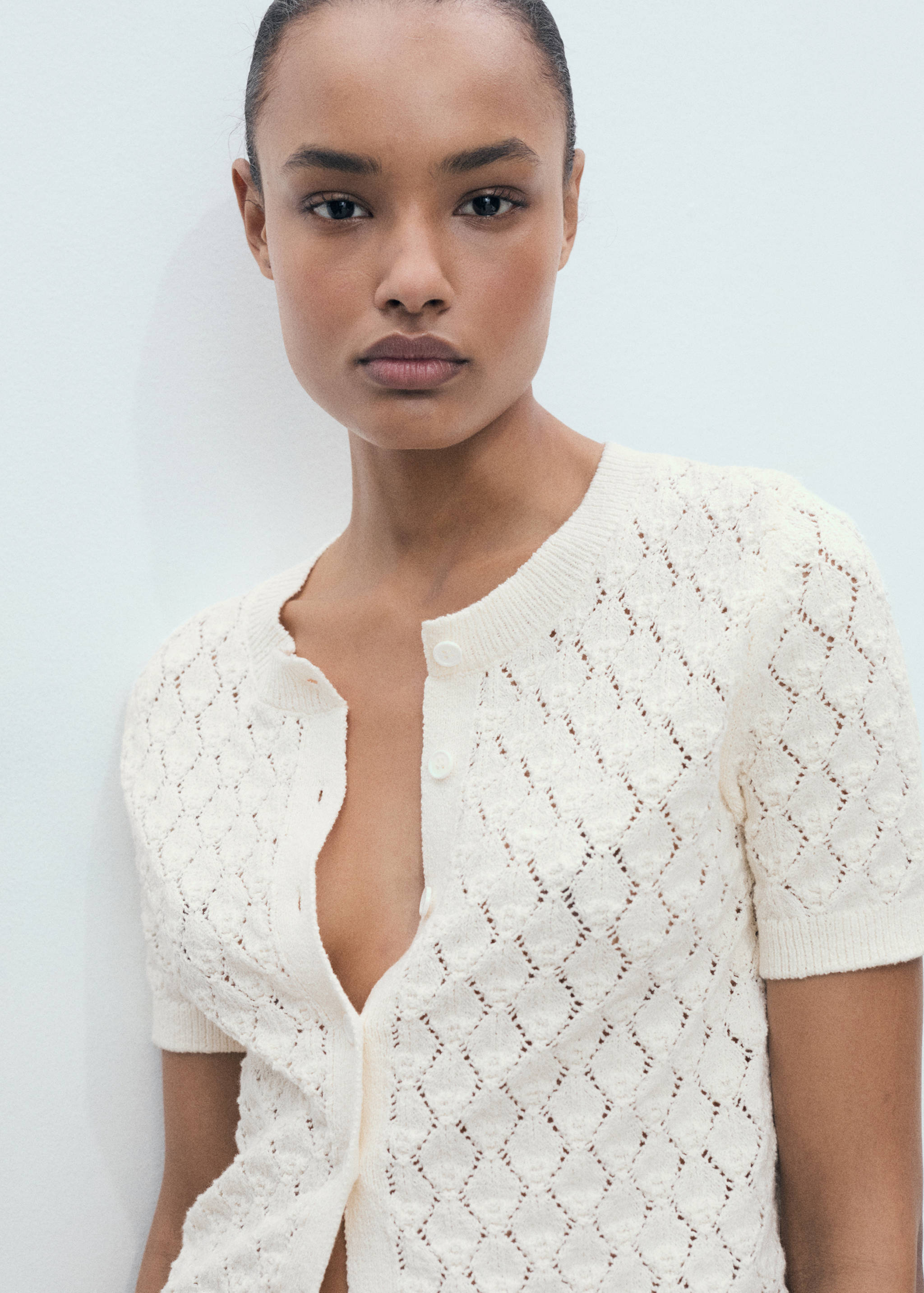 Short-sleeved openwork knitted cardigan - Medium plane