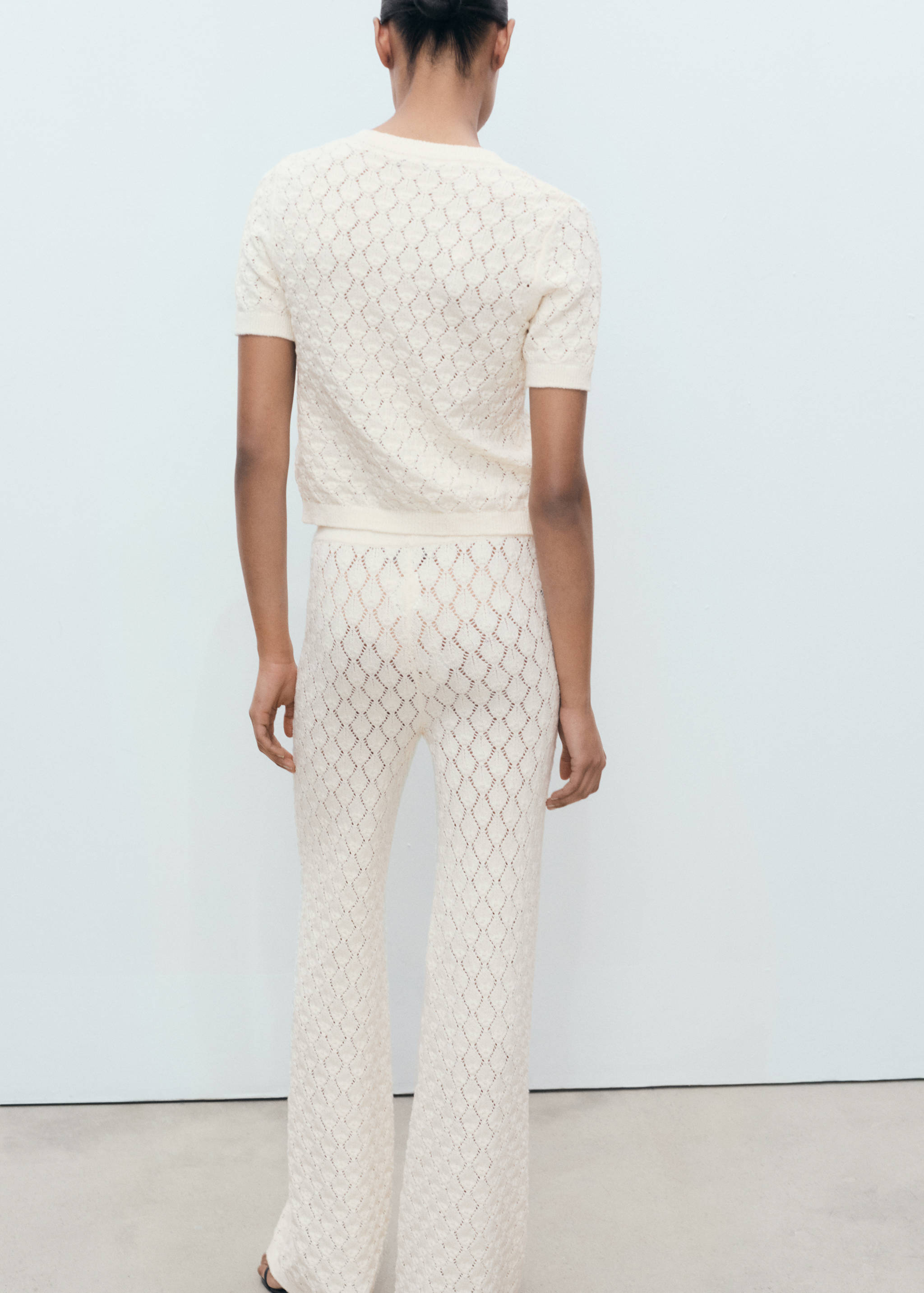 Short-sleeved openwork knitted cardigan - Reverse of the article