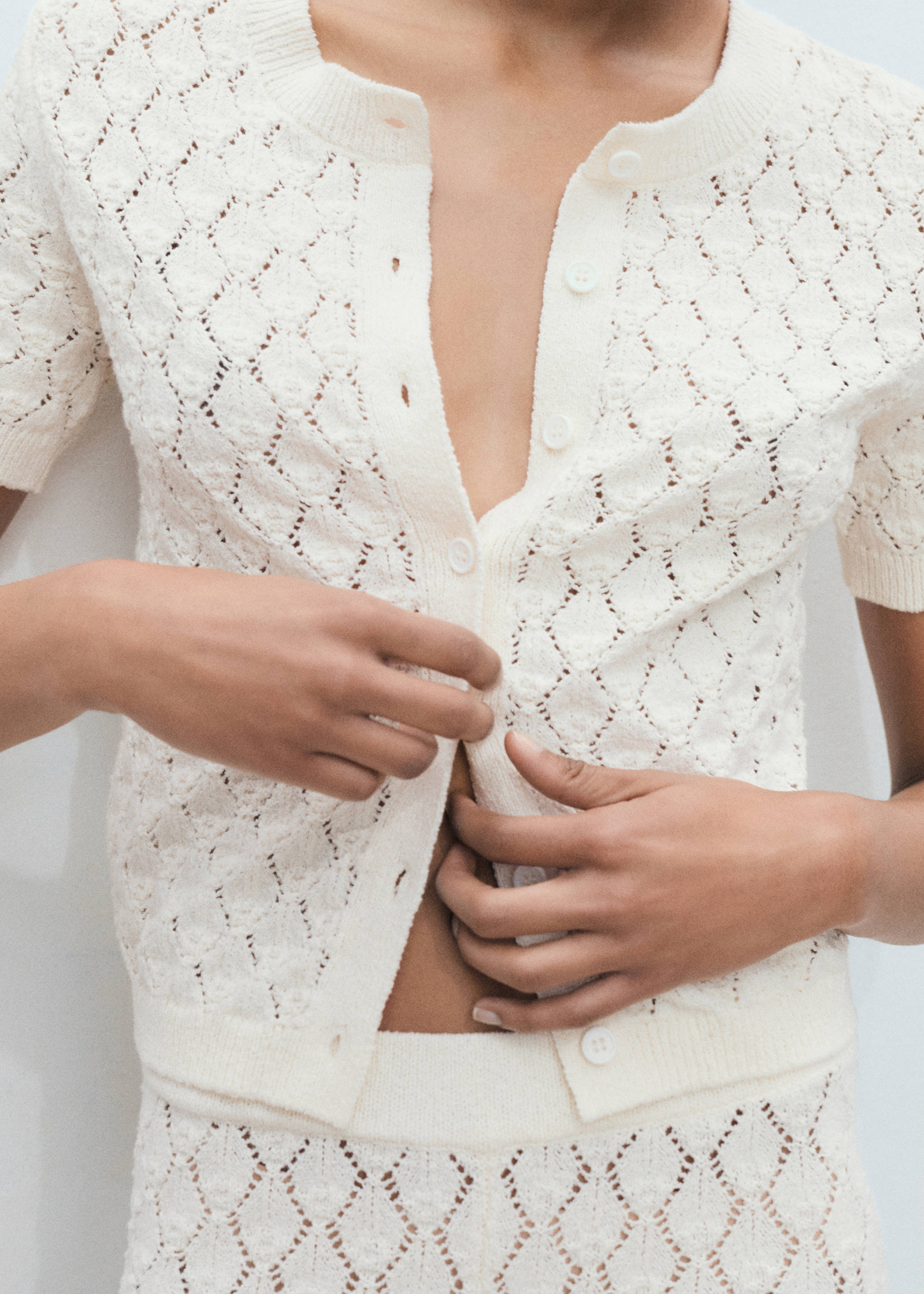 Short-sleeved openwork knitted cardigan - Details of the article 6