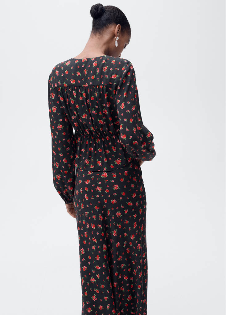 Ruffled floral blouse — Black