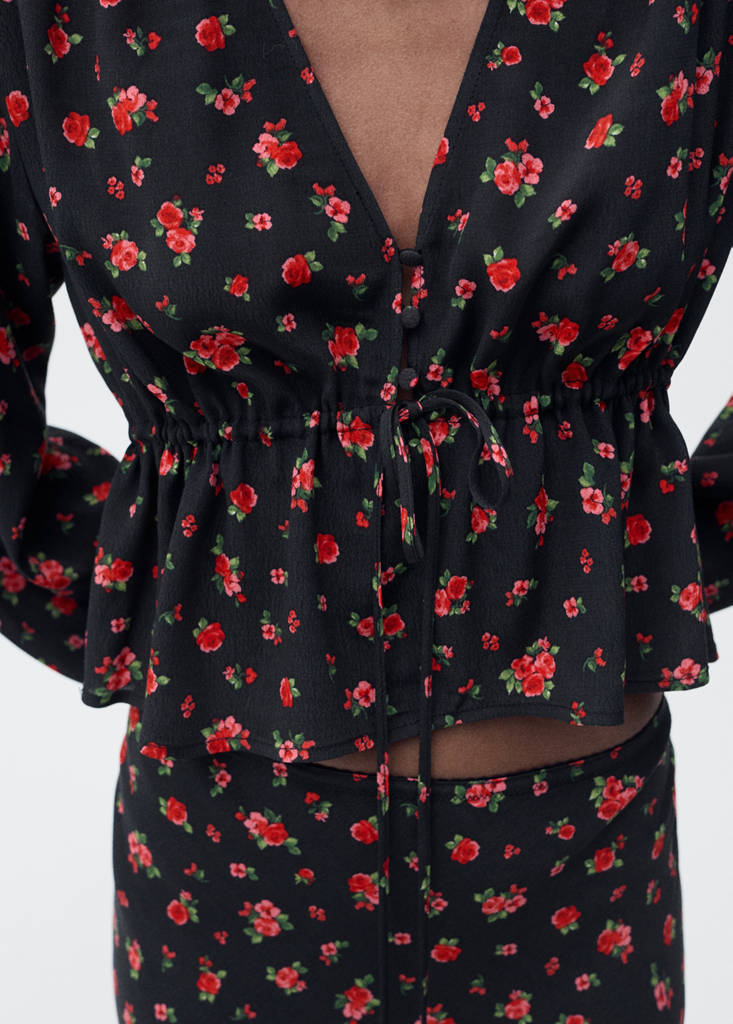 Ruffled floral blouse — Black