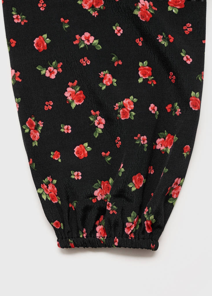 Ruffled floral blouse — Black
