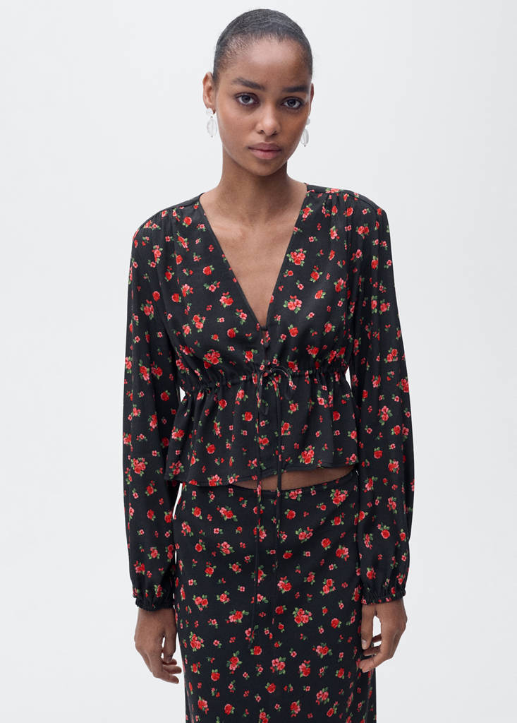 Ruffled floral blouse — Black