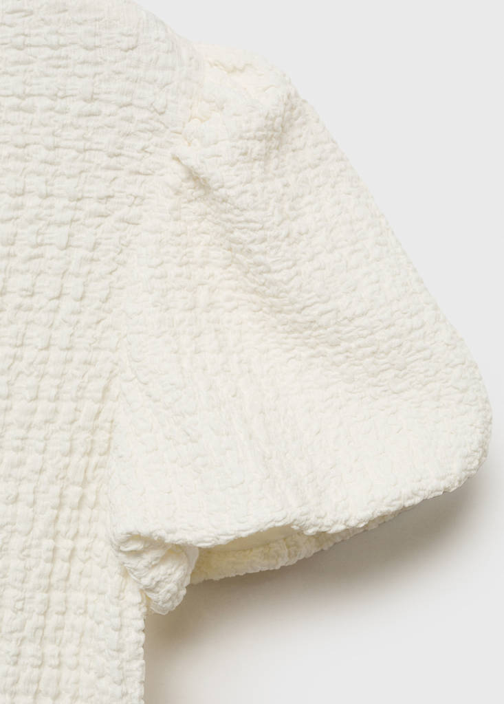 Textured blouse with bow closure — Ecru