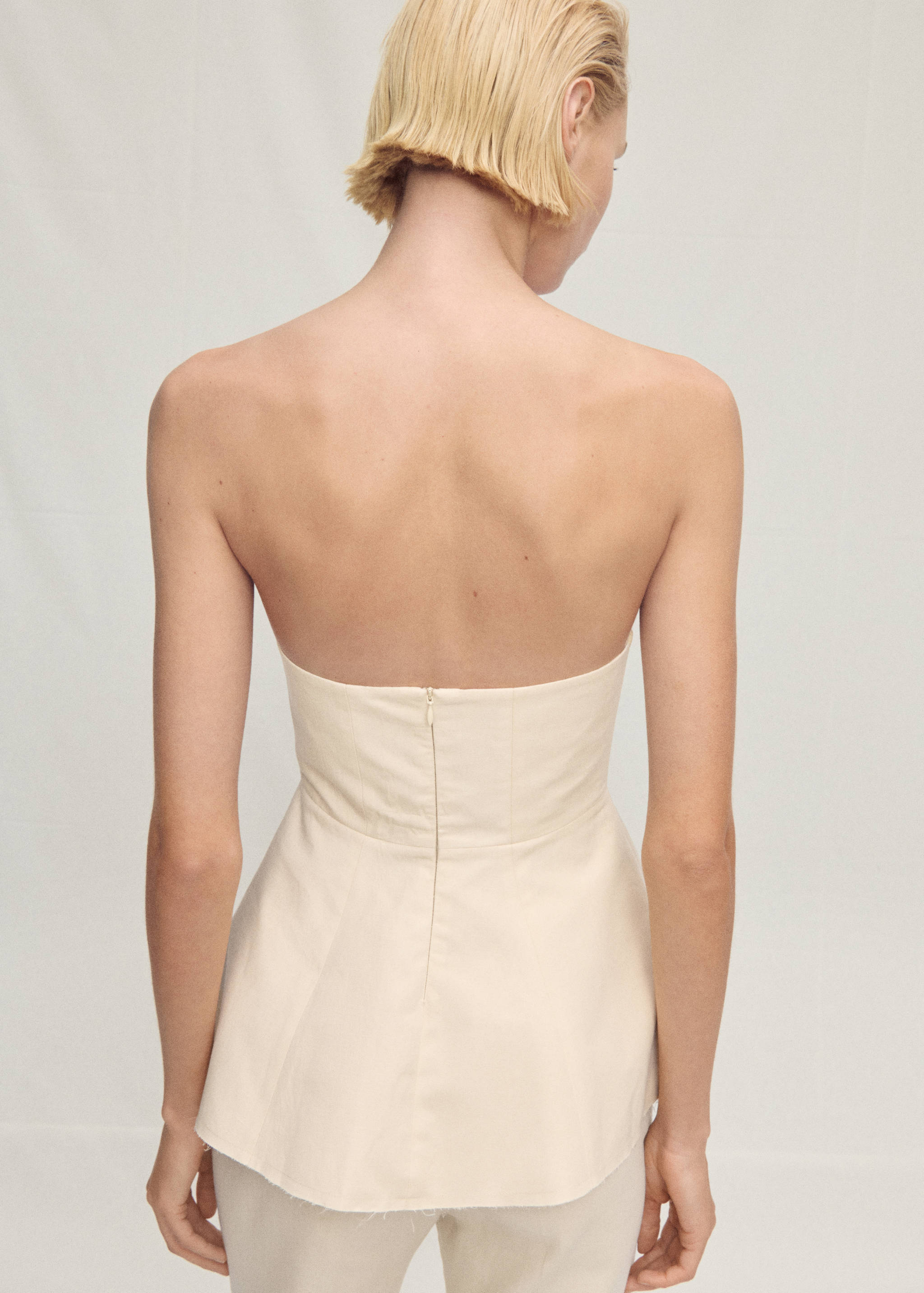 Schulterfreies Peplum-Top - Rückseite des Artikels