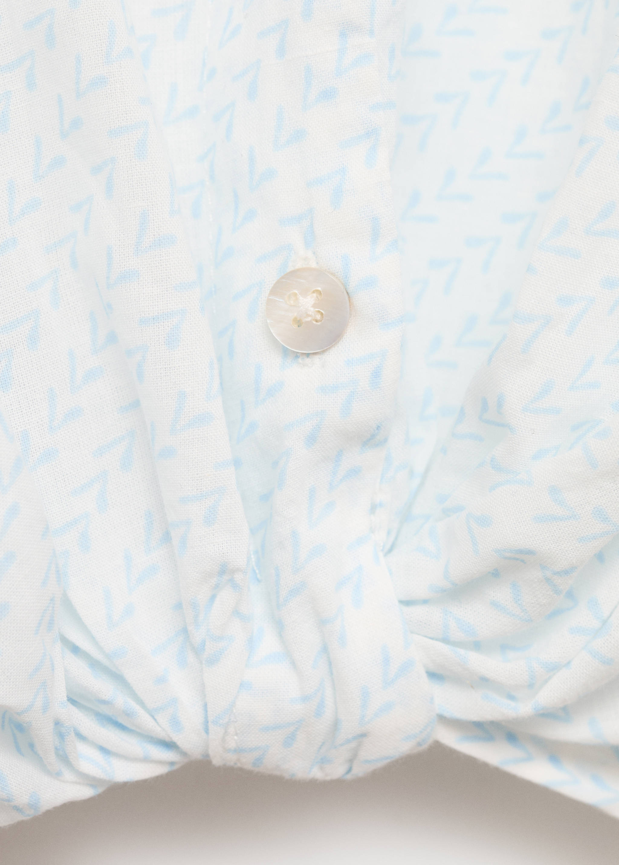 بلوزة  قصيرة محبوكة - تفاصيل المنتج 0