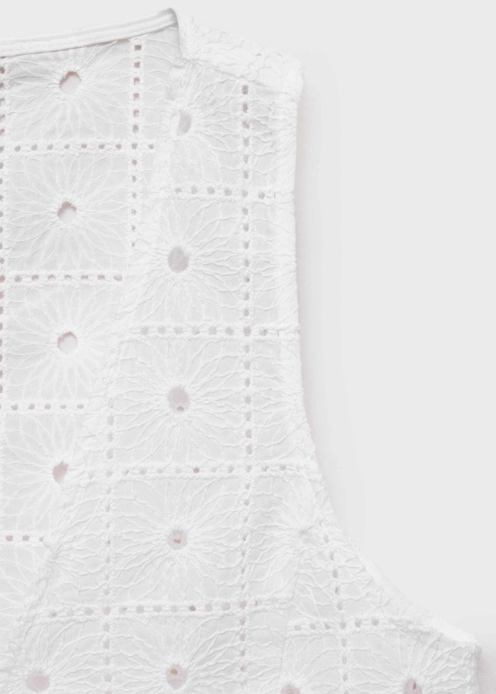 Embroidered cotton vest with bows - Details of the article 0