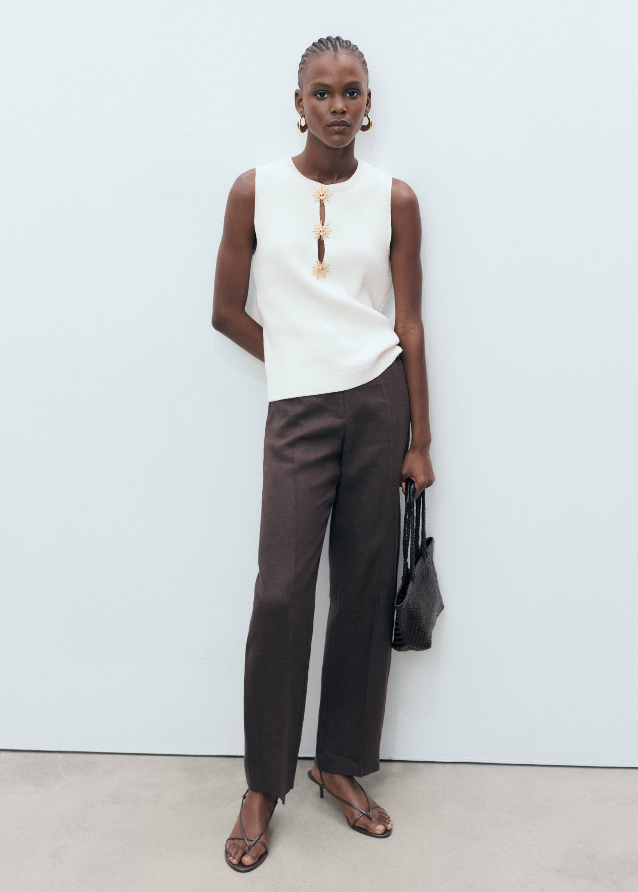 Strikket topp med solsmykke-knapper - Total bildeutsnitt