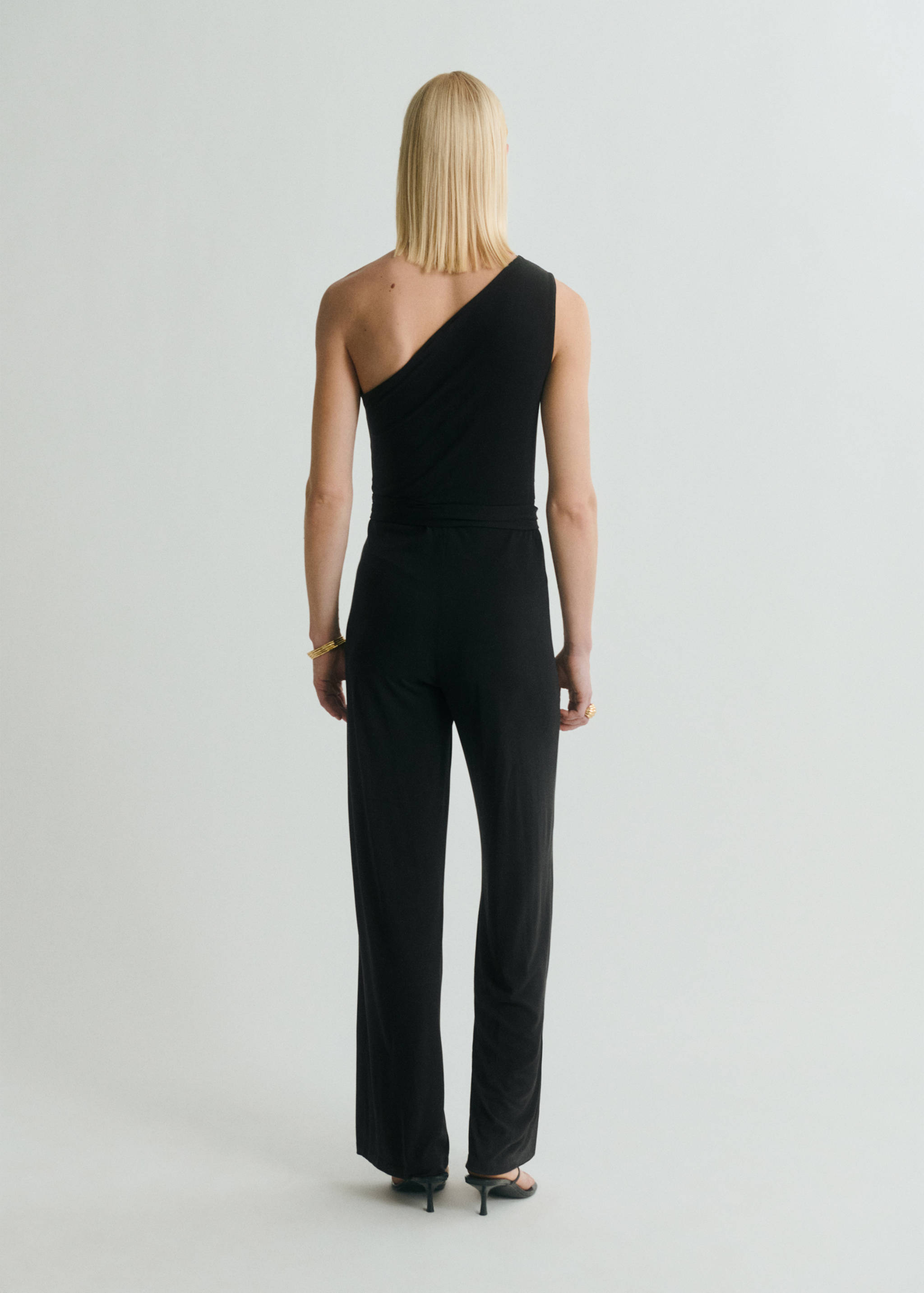 Asymmetric belt jumpsuit - Reverse of the article