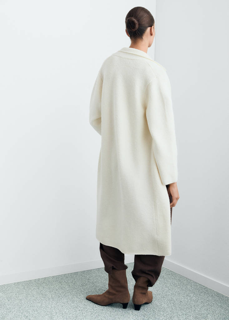 Knitted coat with pockets — Ecru