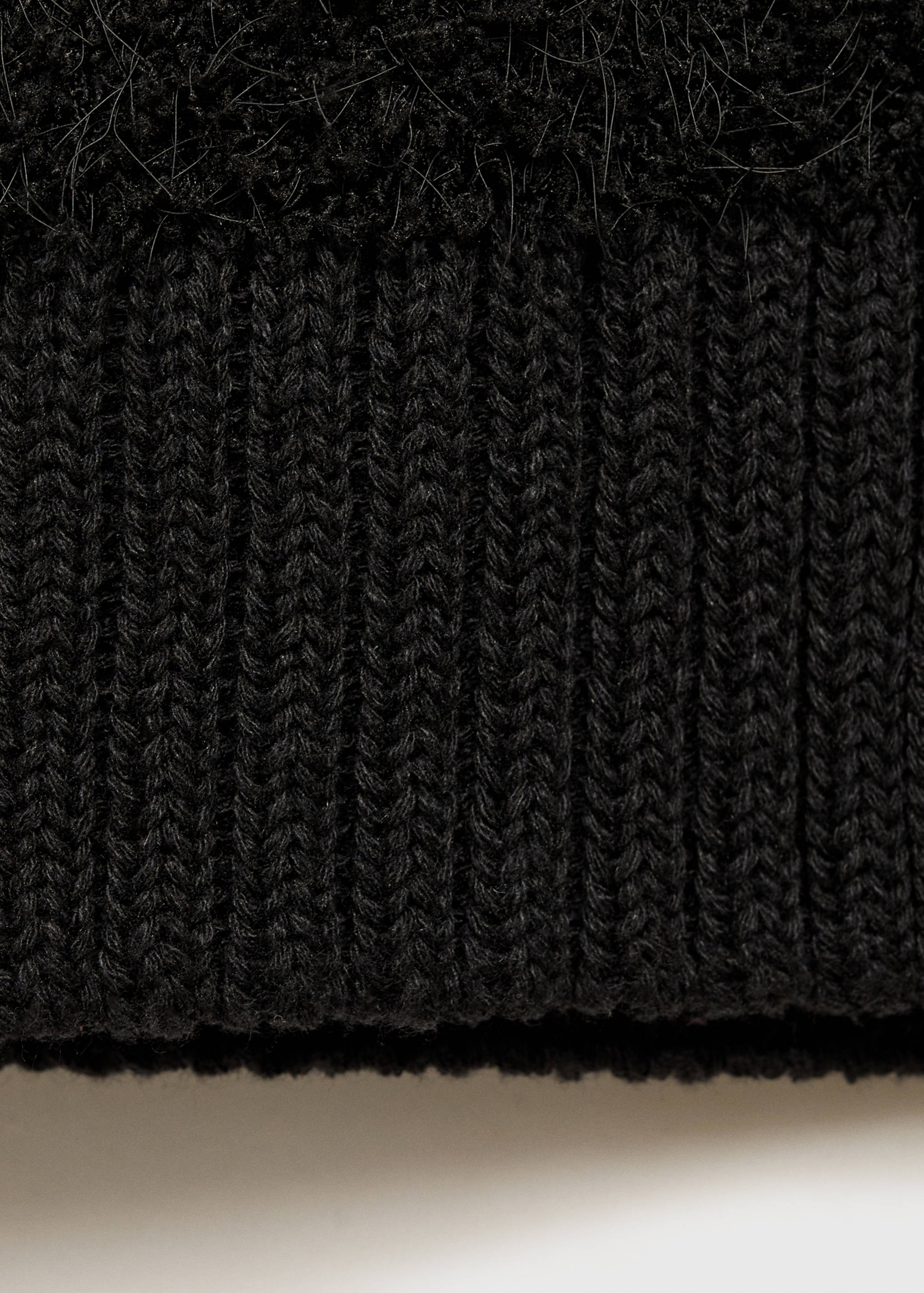 Knitted vest with buttons - Details of the article 0