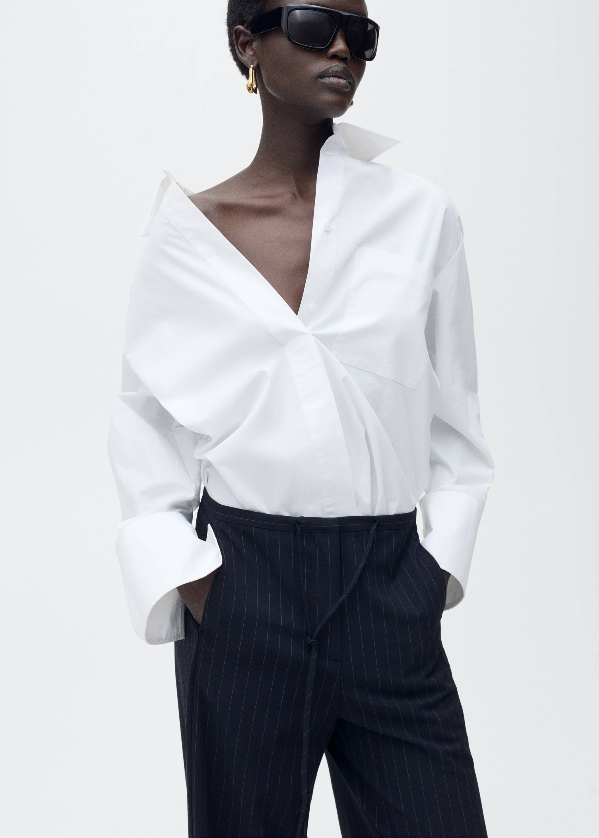 Chalk-stripe straight trousers - Details of the article 2