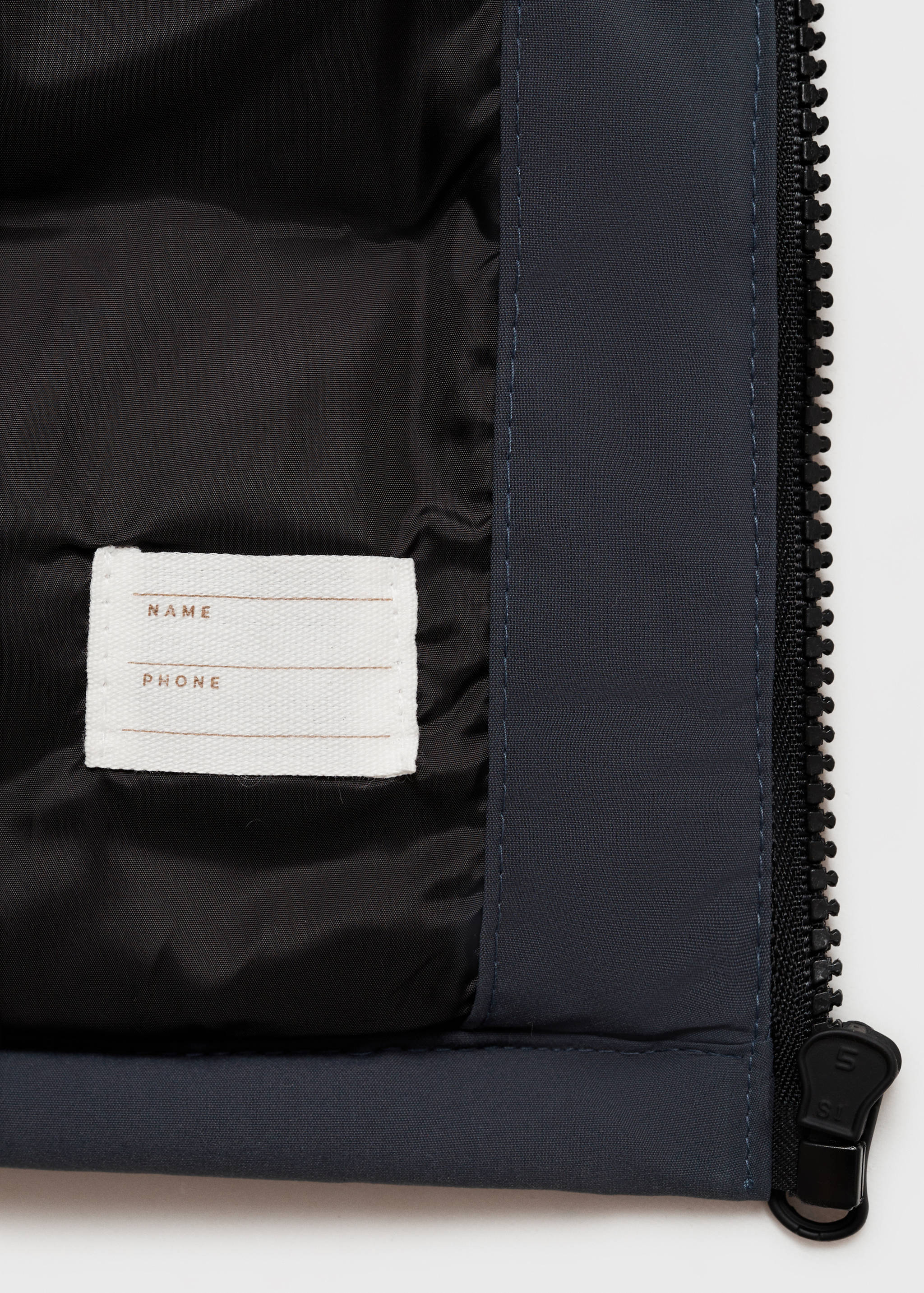 Gilet matelassé à capuche - Détail de l'article 8