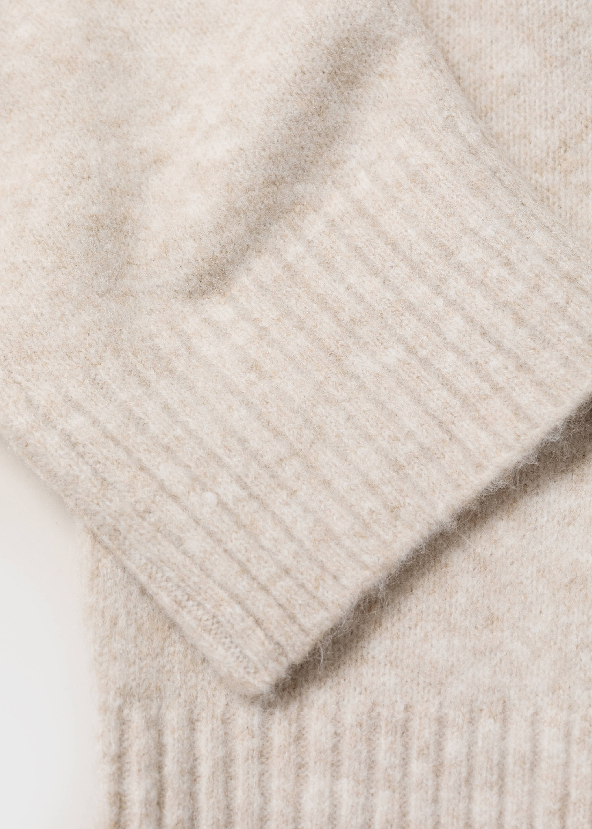 Kort stickad kofta - Detaljer om artikeln 0