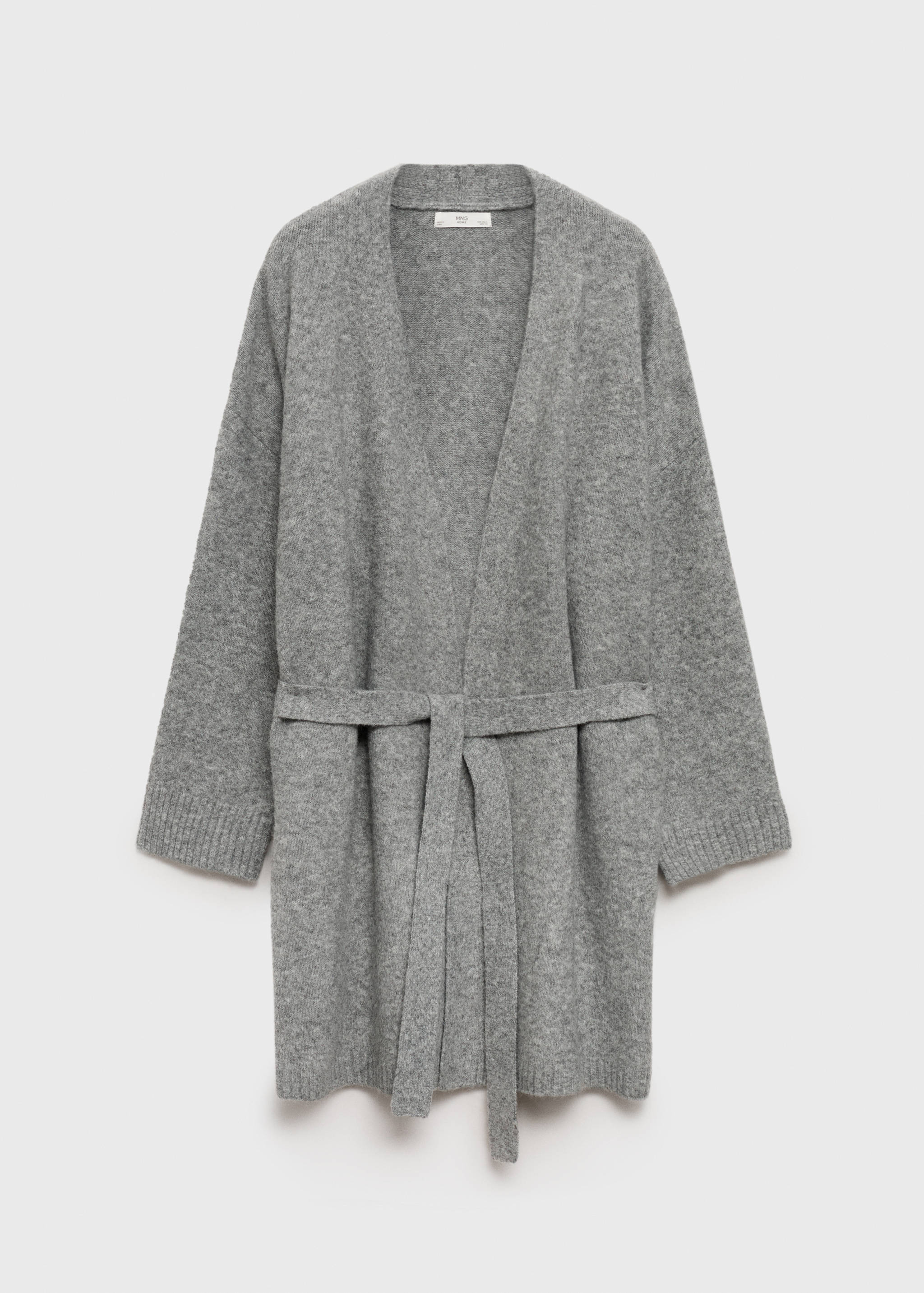 Short knitted cardigan - Article without model