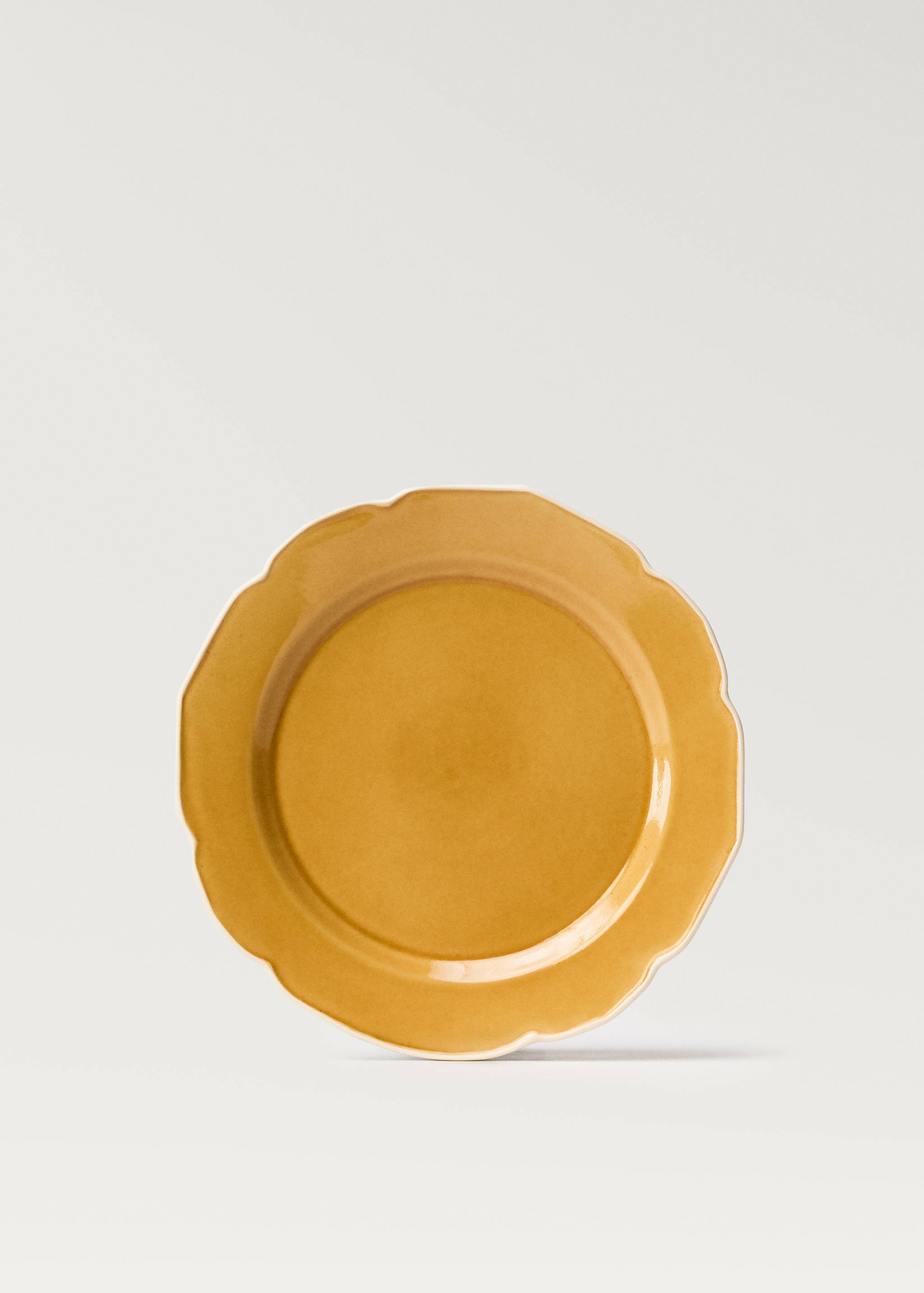 Stoneware flat plate with wavy design - Article without model