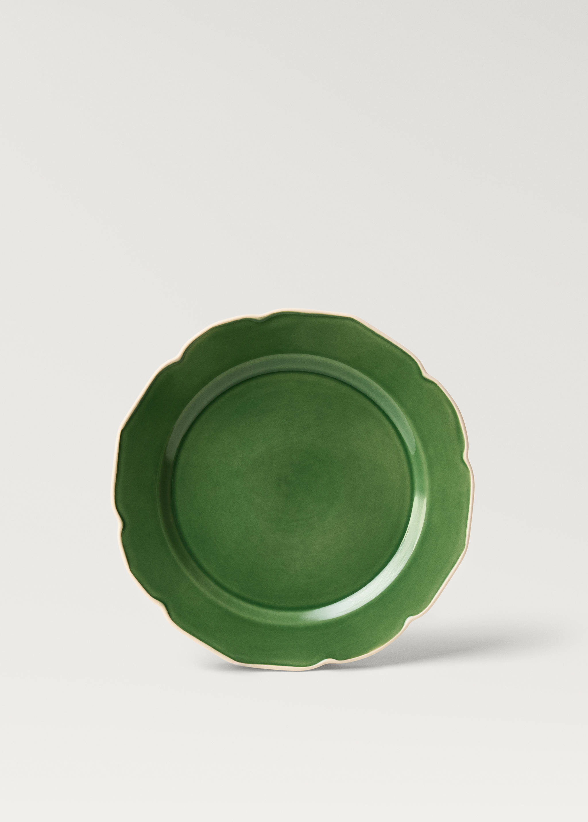 Stoneware flat plate with wavy design - Article without model