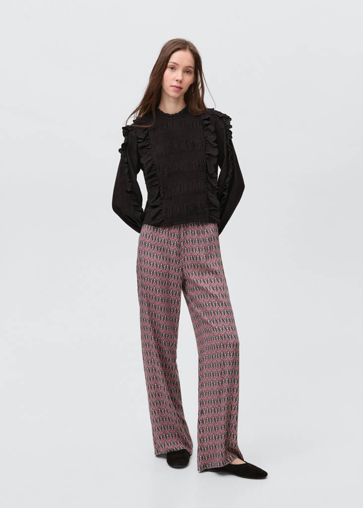 Ruched blouse with ruffles — Black