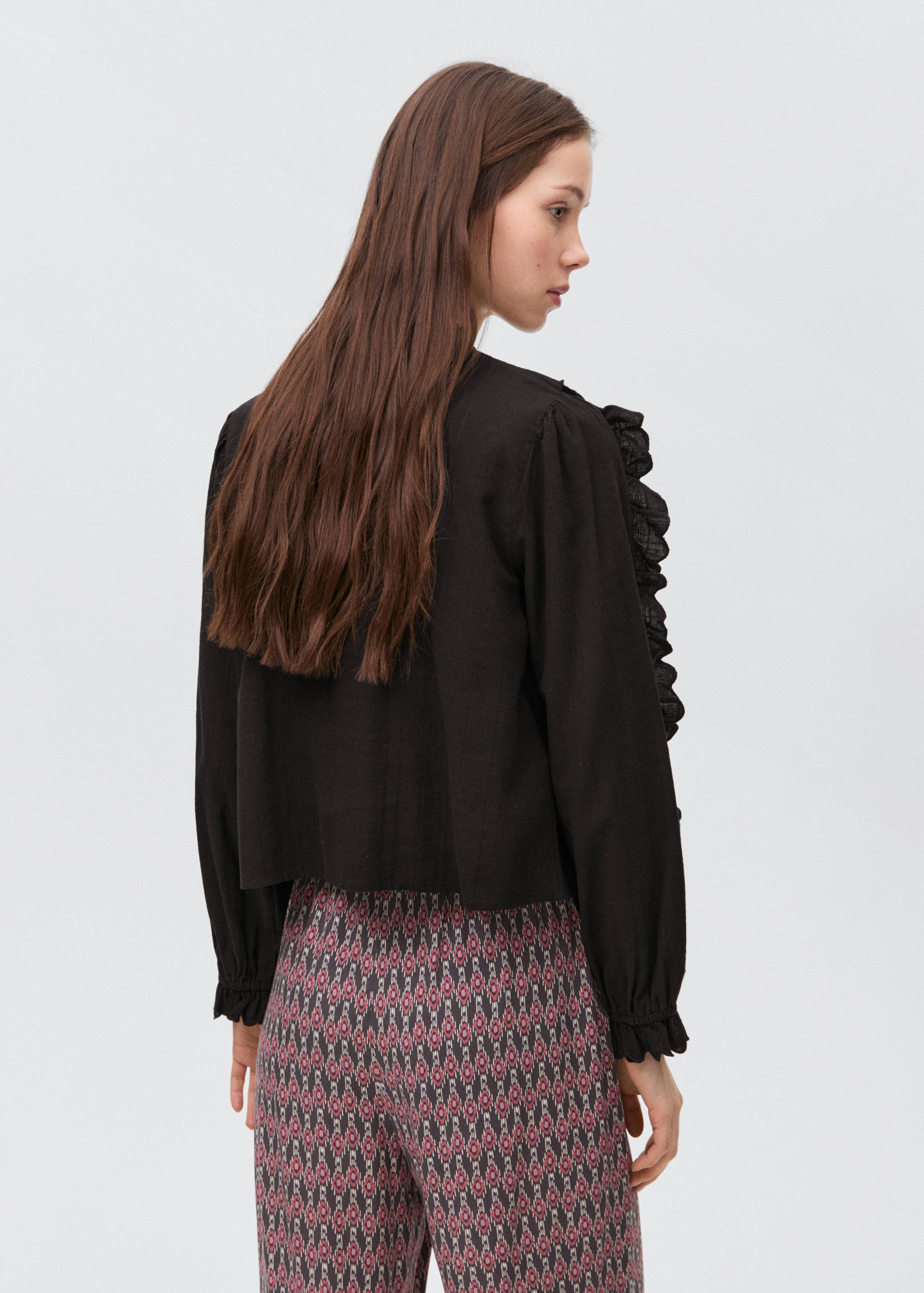 Blusa fruncida volantes - Reverso del artículo