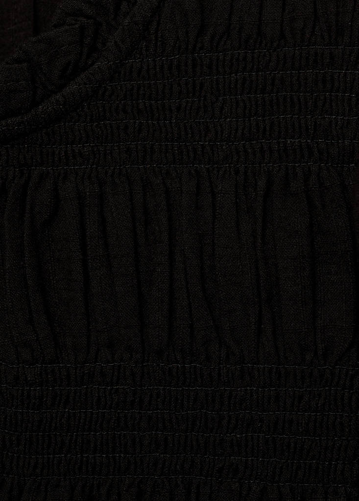 Ruched blouse with ruffles — Black