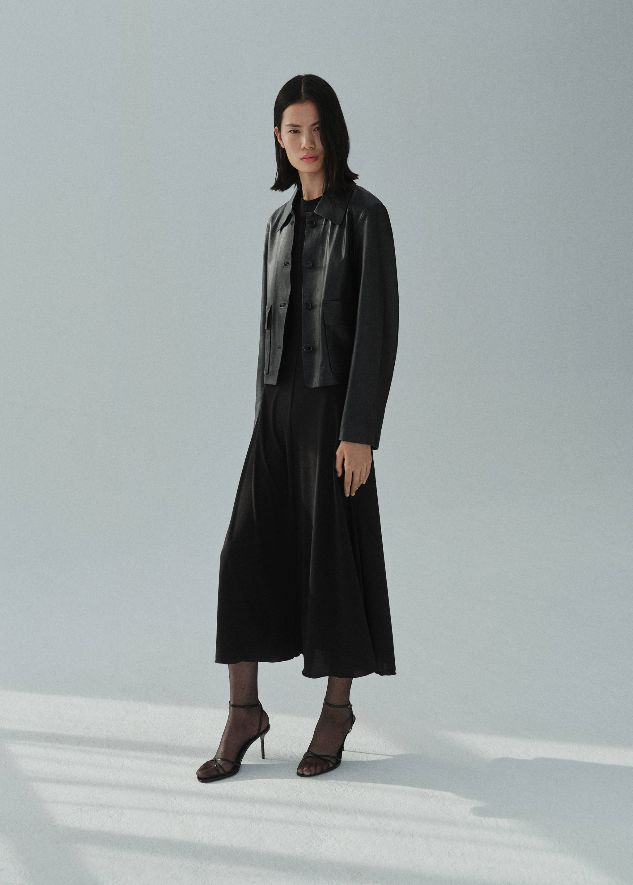 Buttoned leather jacket - General plane