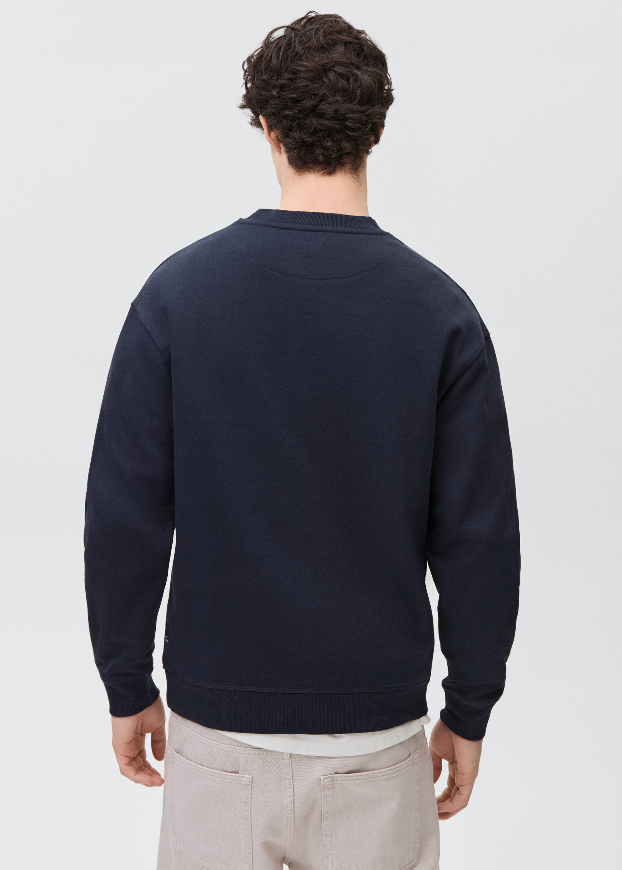 Cotton sweatshirt with embossed message - Reverse of the article