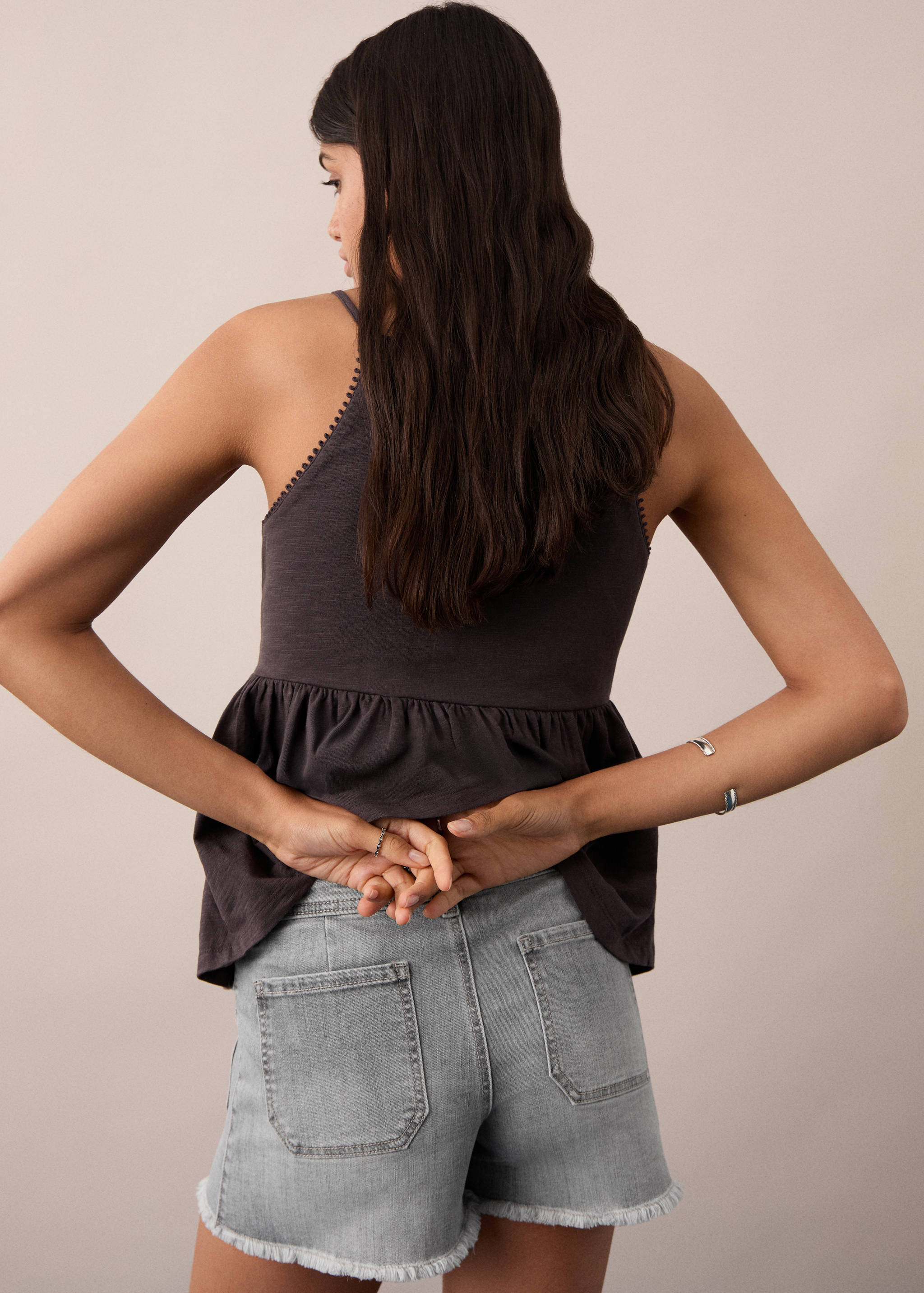 Denim shorts with frayed hem - Reverse of the article