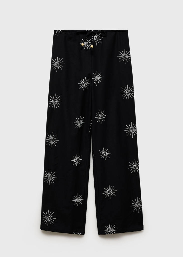 Long trousers with embroidered details — Black