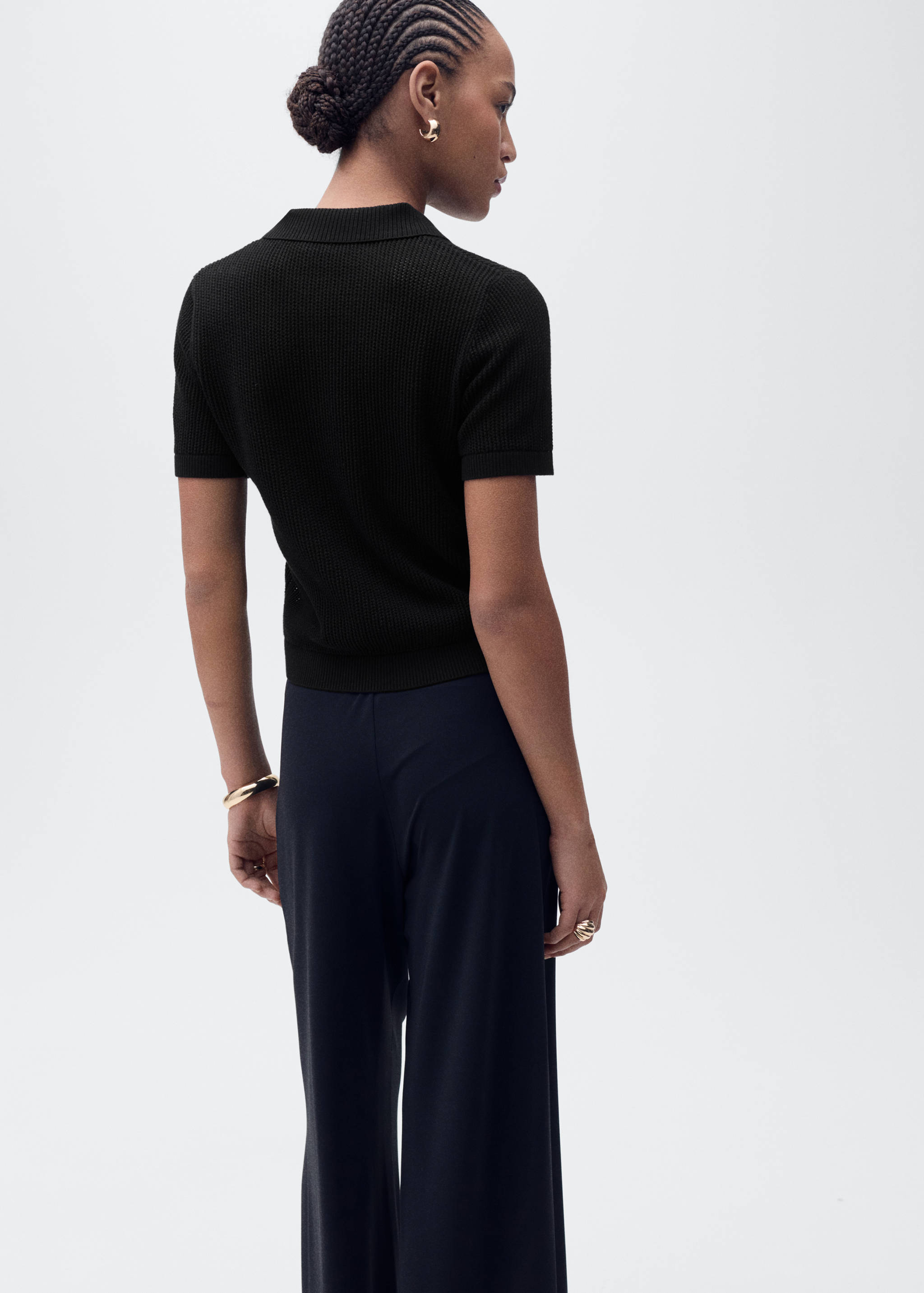 Openwork knitted polo-neck sweater - Reverse of the article