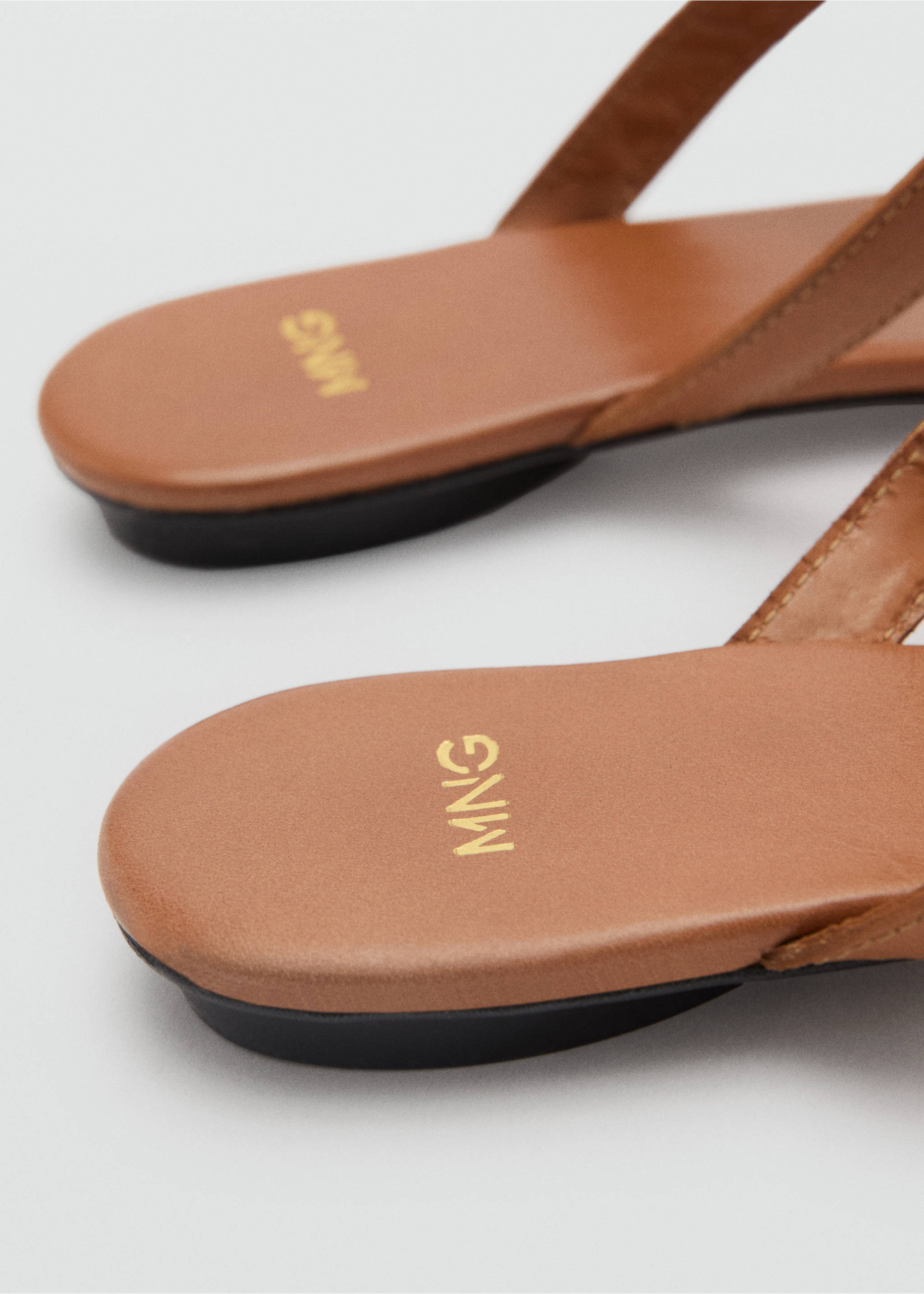 Close-up of brown sandals showing gold MNG logo on the insole., Medium Brown. Ref: 87095993-00.